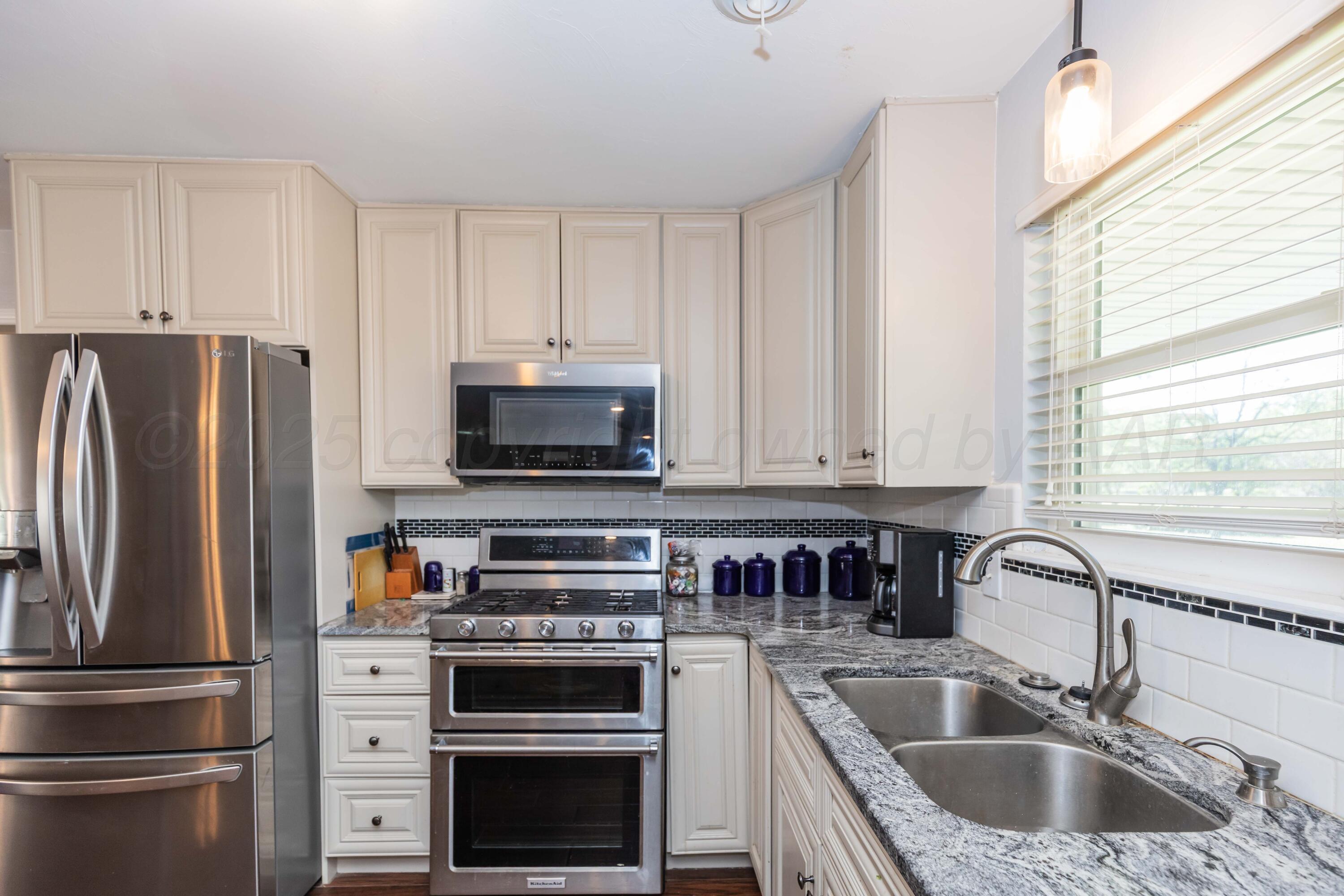 4 Sheffield Road Amarillo, TX 79124 - Photo 10 of 51 KITCHEN VIEW 5