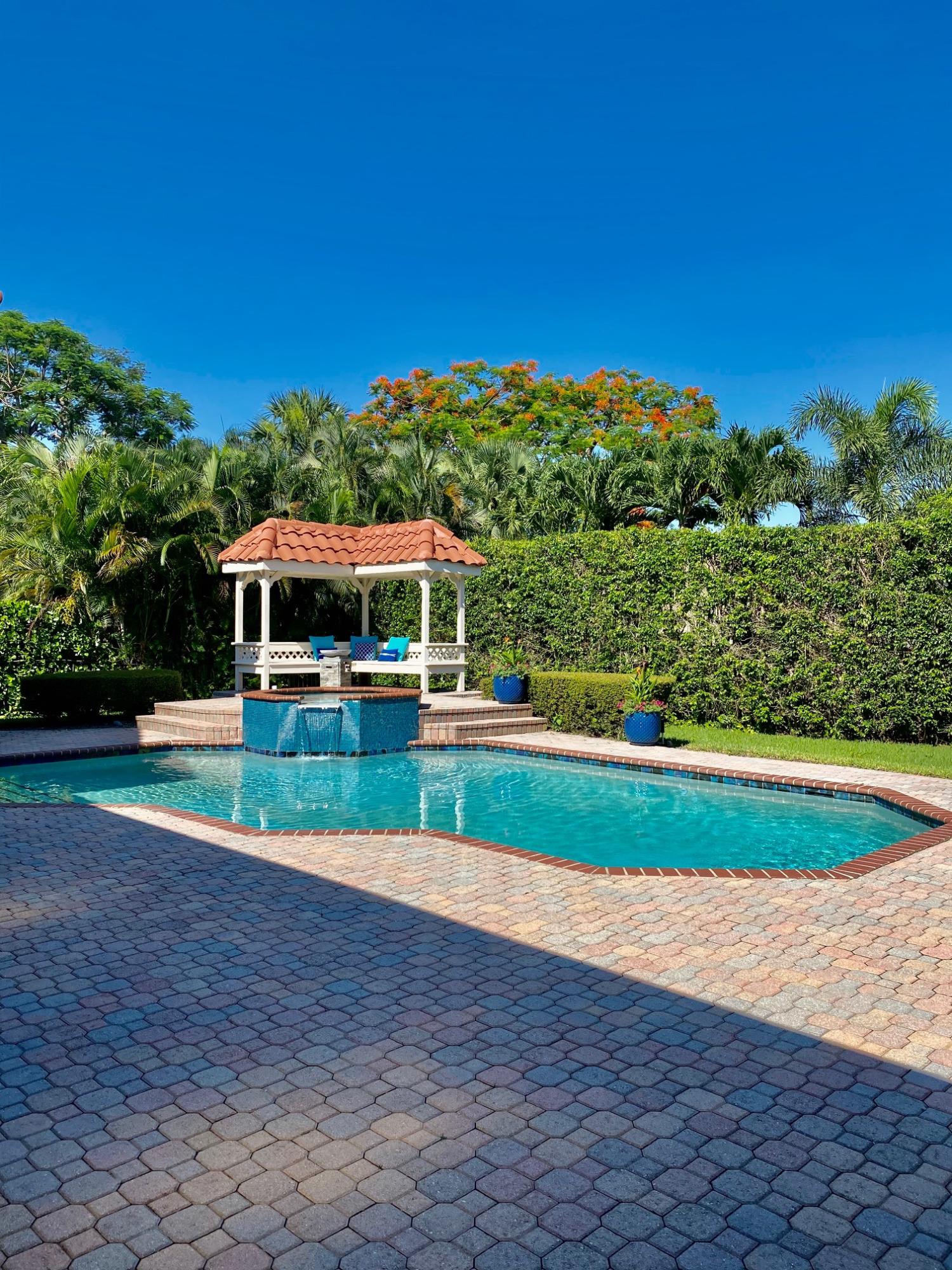1605 Southwest 20th Avenue Boca Raton, FL 33486 - Photo 13 of 70 a view of green field with house in the background
