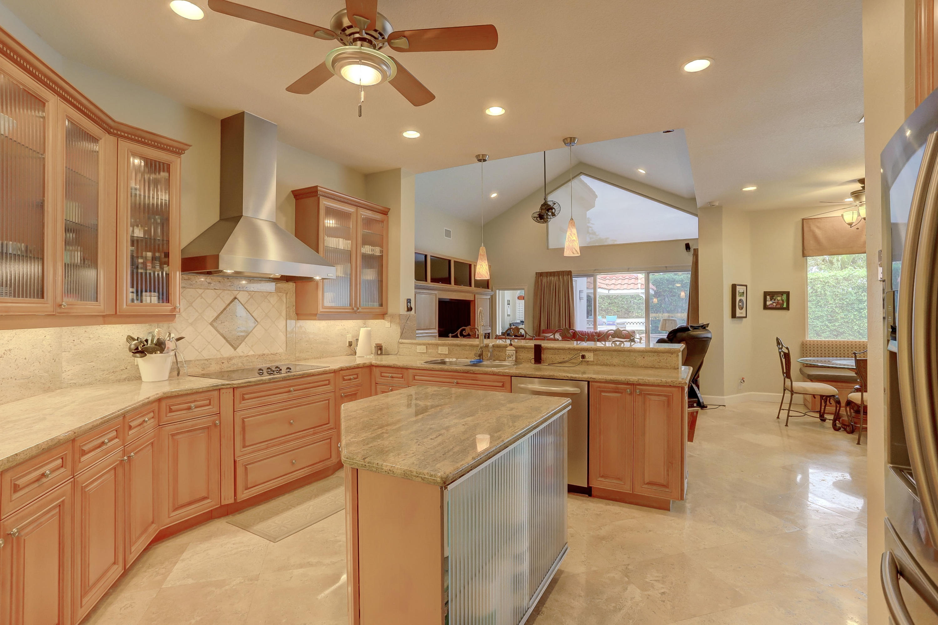 1605 Southwest 20th Avenue Boca Raton, FL 33486 - Photo 17 of 70 a kitchen with lots of counter top space and painting on the wall