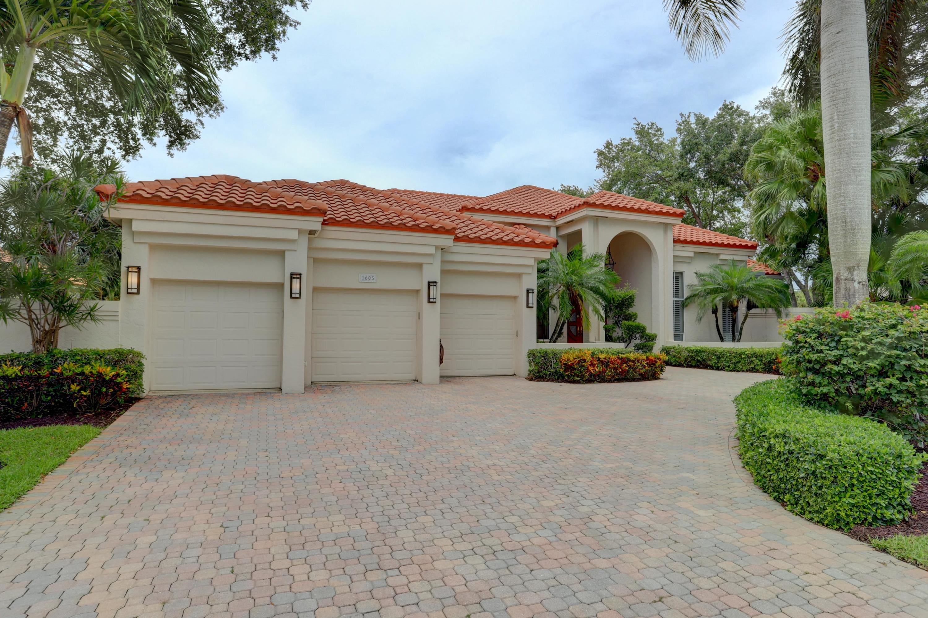 1605 Southwest 20th Avenue Boca Raton, FL 33486 - Photo 2 of 70 front view of a house with a street