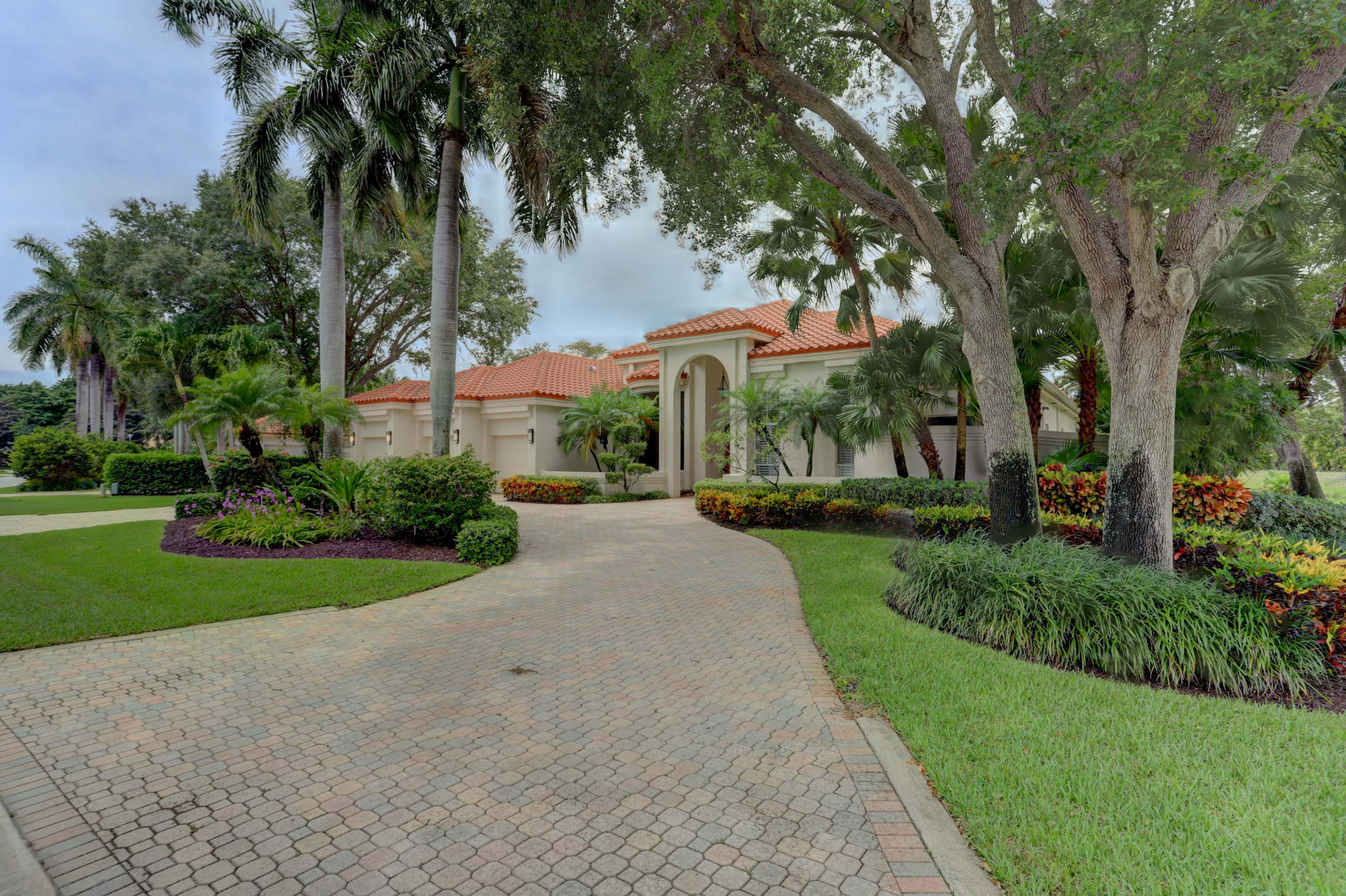 1605 Southwest 20th Avenue Boca Raton, FL 33486 - Photo 21 of 70 a view of a street with a building and palm trees