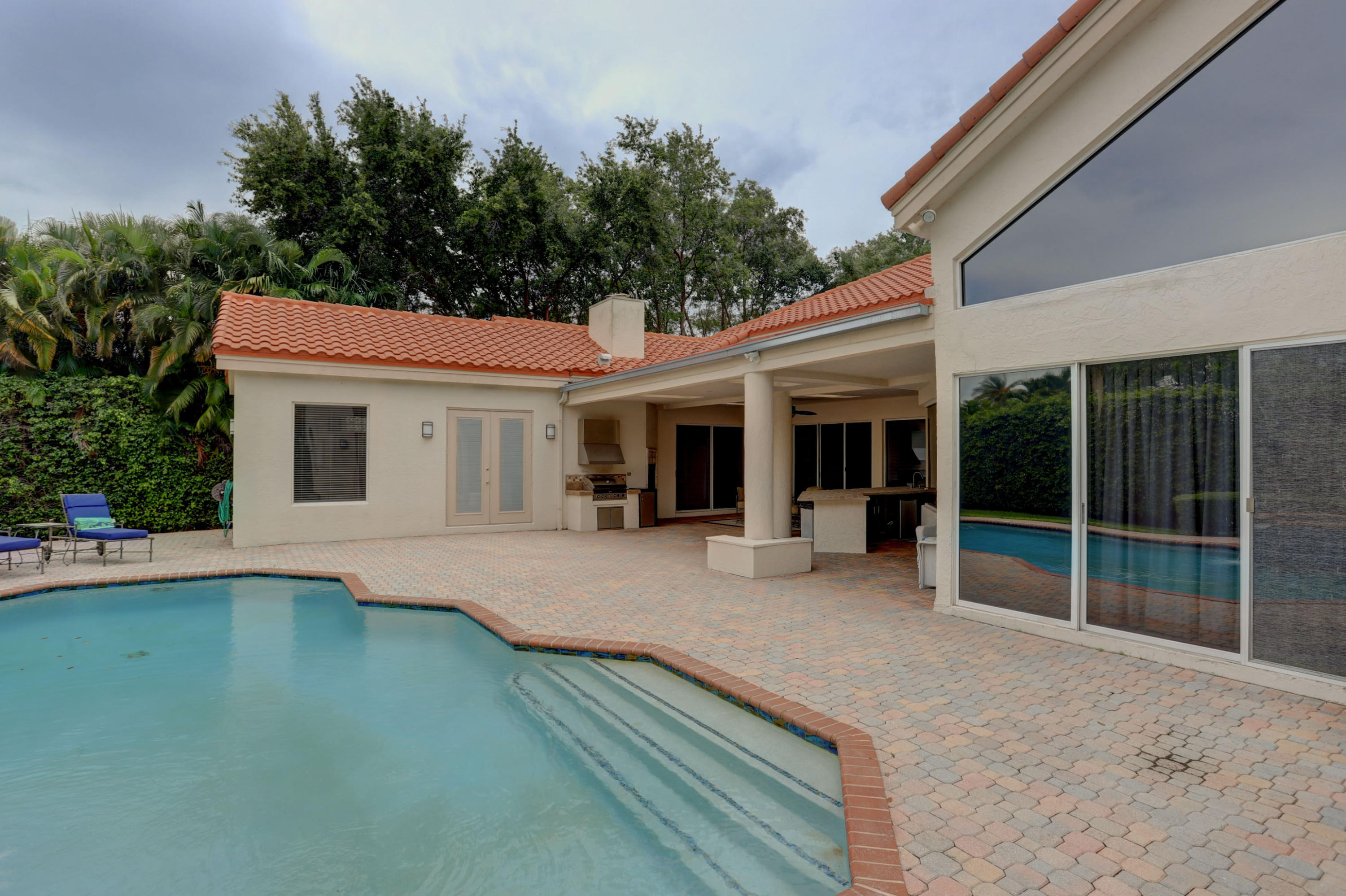 1605 Southwest 20th Avenue Boca Raton, FL 33486 - Photo 22 of 70 front view of a house with a yard