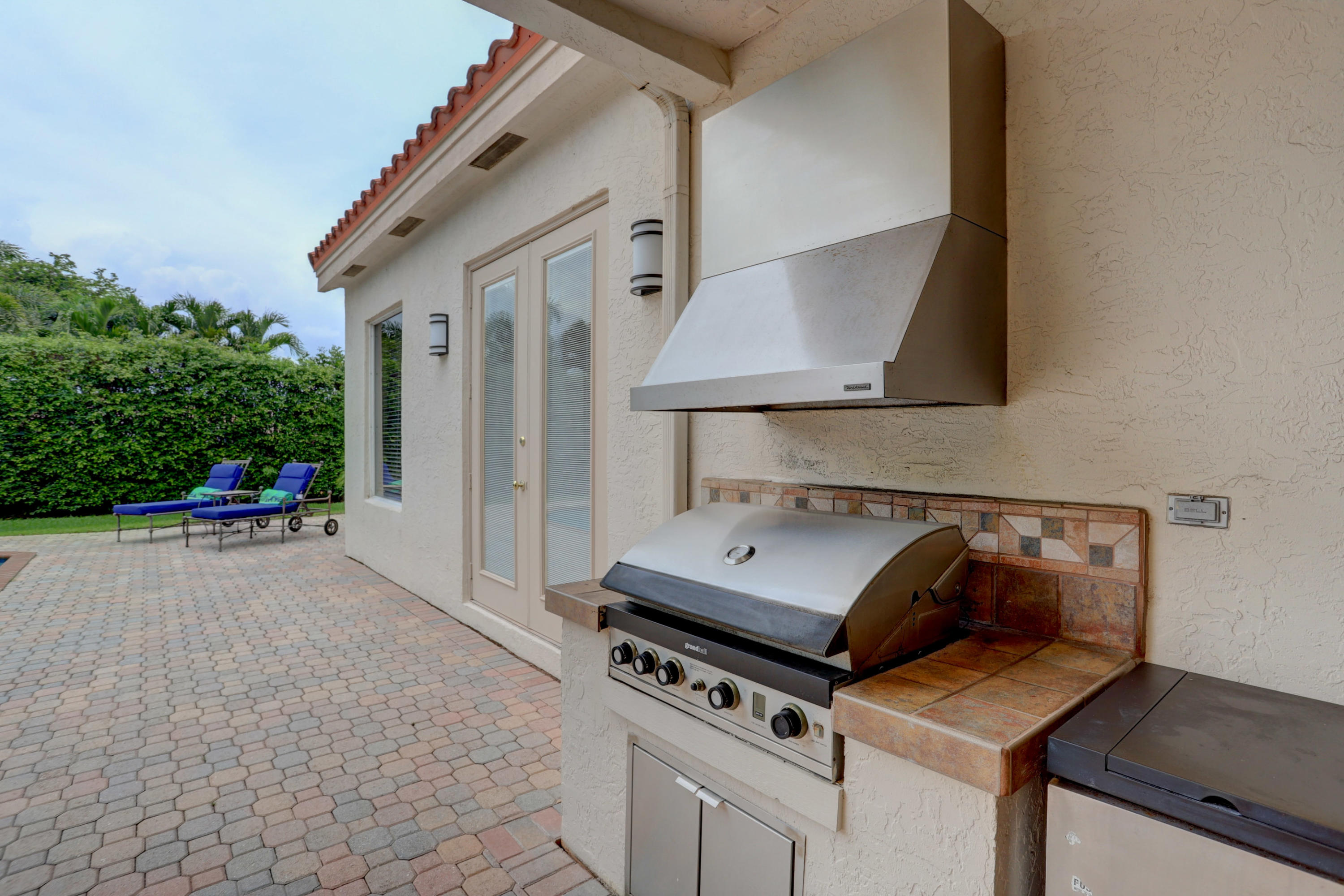 1605 Southwest 20th Avenue Boca Raton, FL 33486 - Photo 24 of 70 a stove top oven sitting inside of a kitchen