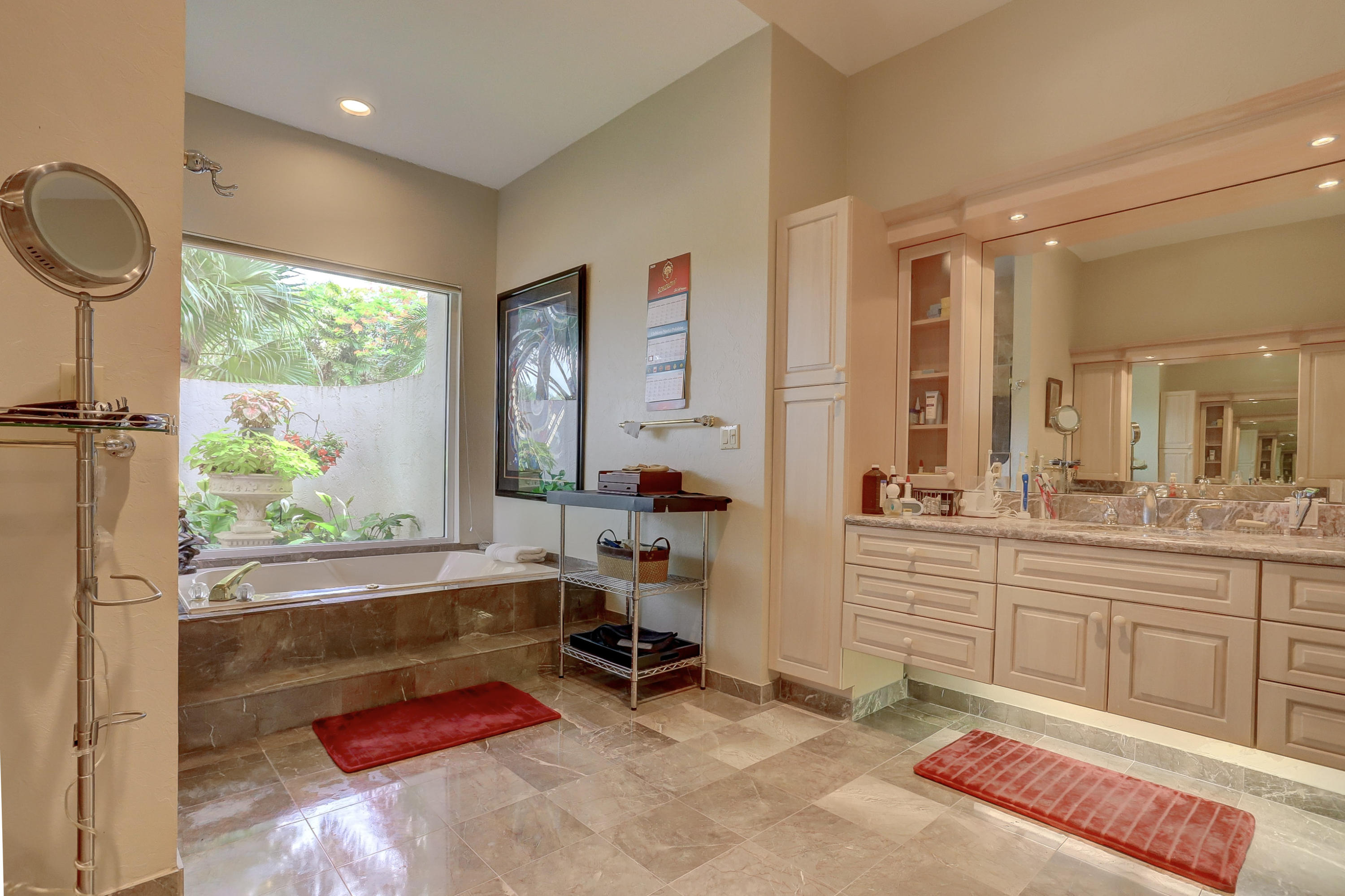 1605 Southwest 20th Avenue Boca Raton, FL 33486 - Photo 39 of 70 a very nice looking room with a large window and a chair