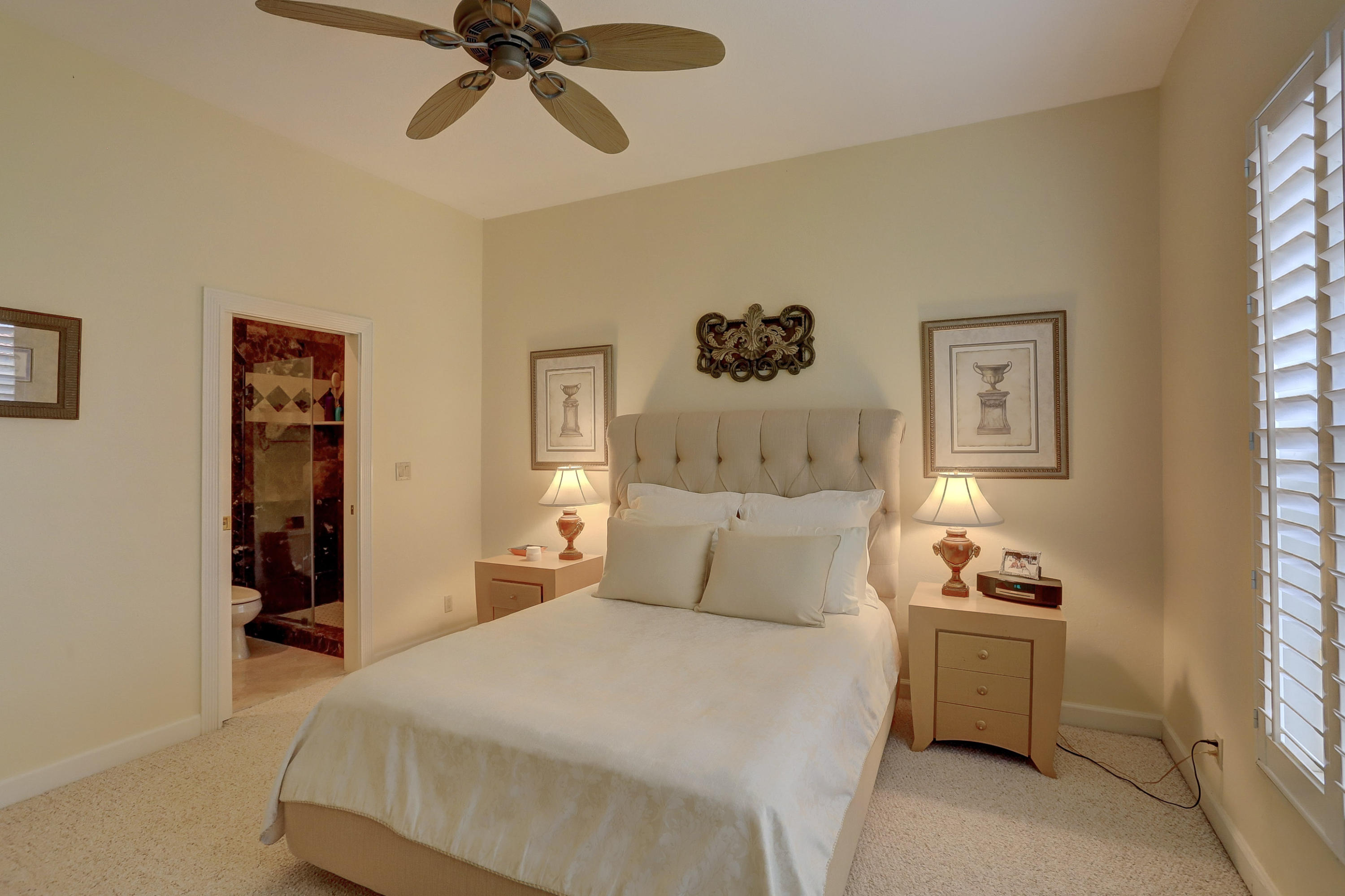 1605 Southwest 20th Avenue Boca Raton, FL 33486 - Photo 44 of 70 a bedroom with a bed and a window