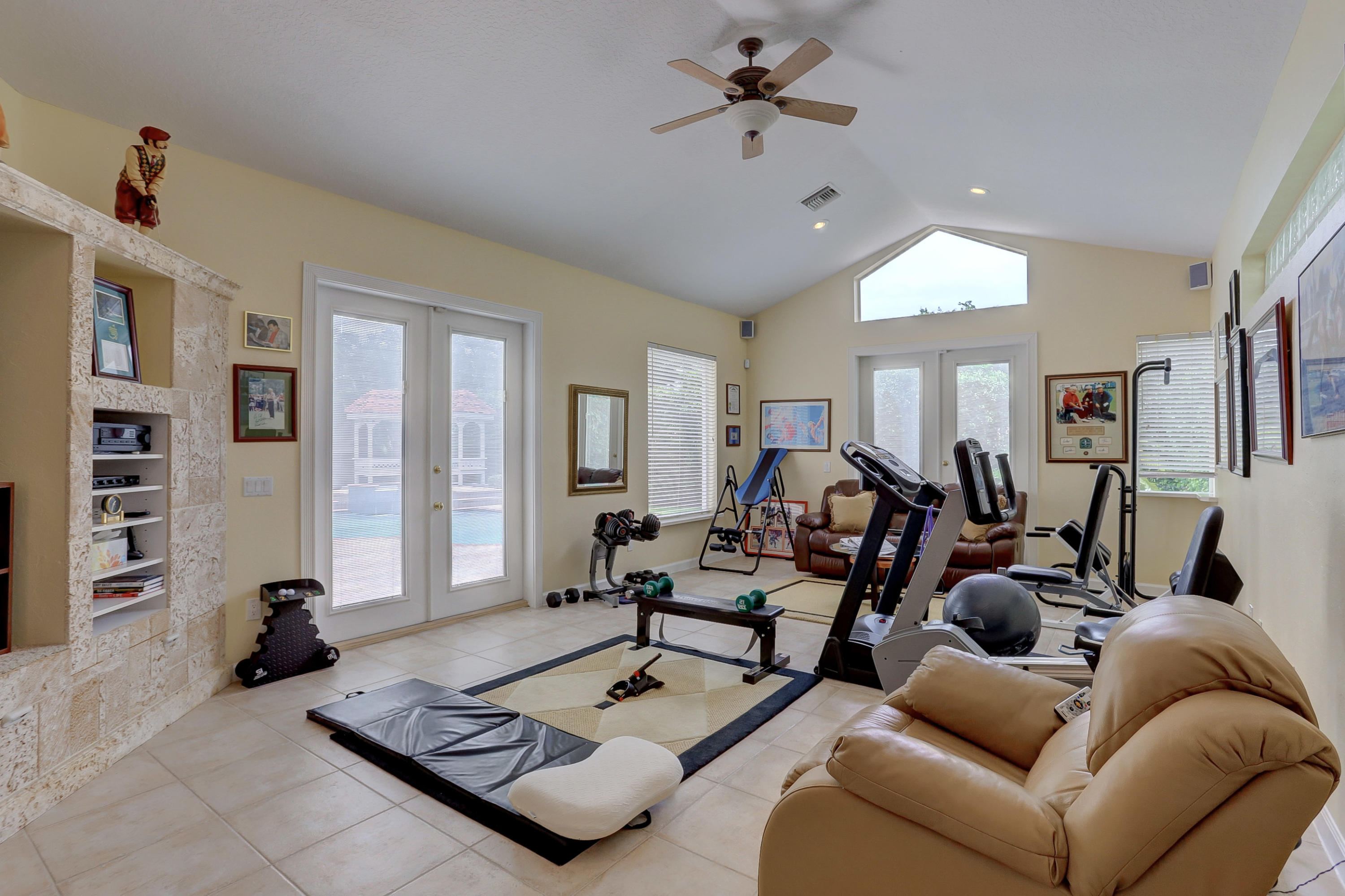 1605 Southwest 20th Avenue Boca Raton, FL 33486 - Photo 52 of 70 a living room with furniture gym and a window