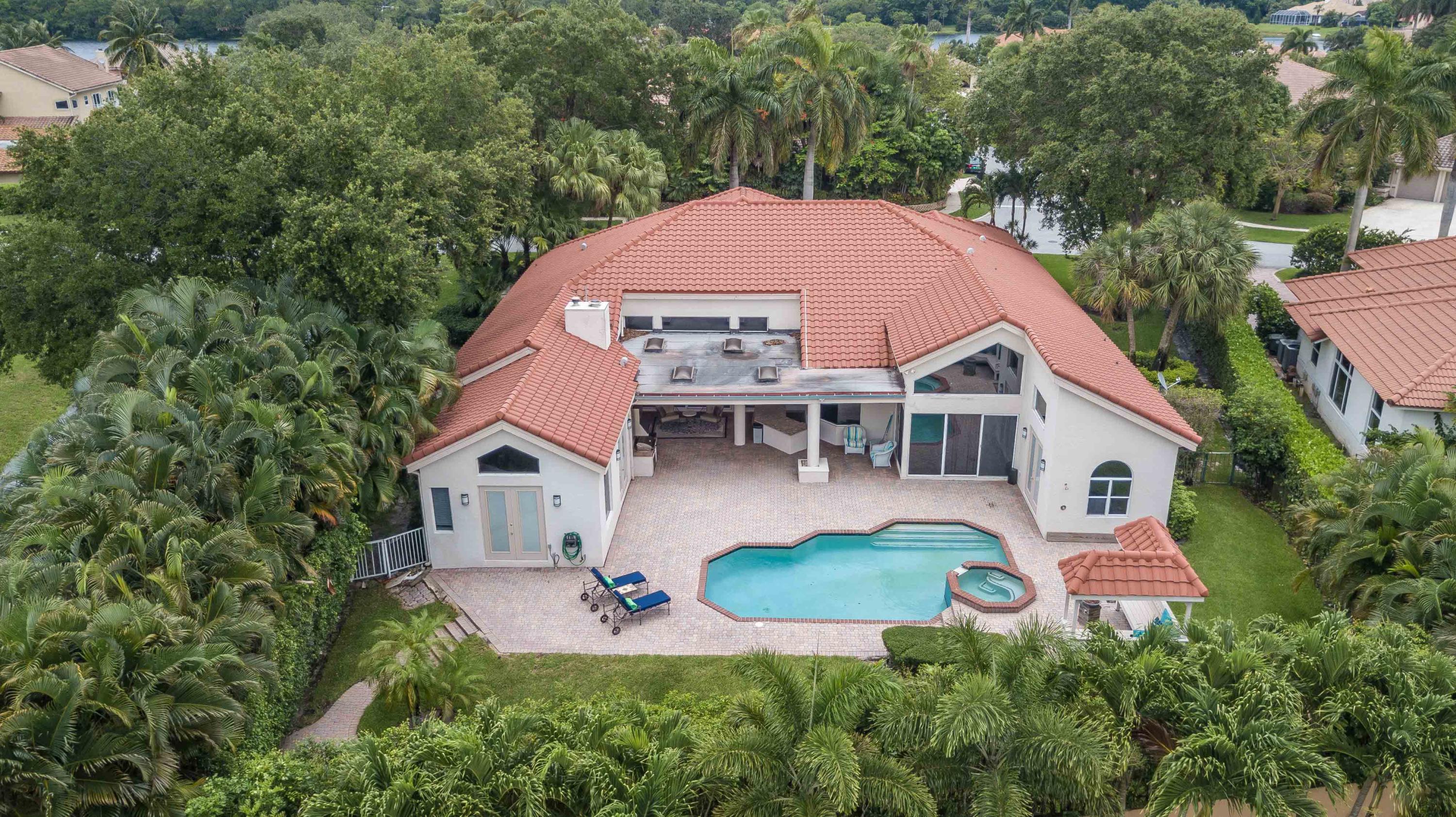 1605 Southwest 20th Avenue Boca Raton, FL 33486 - Photo 59 of 70 an aerial view of a house with swimming pool and porch