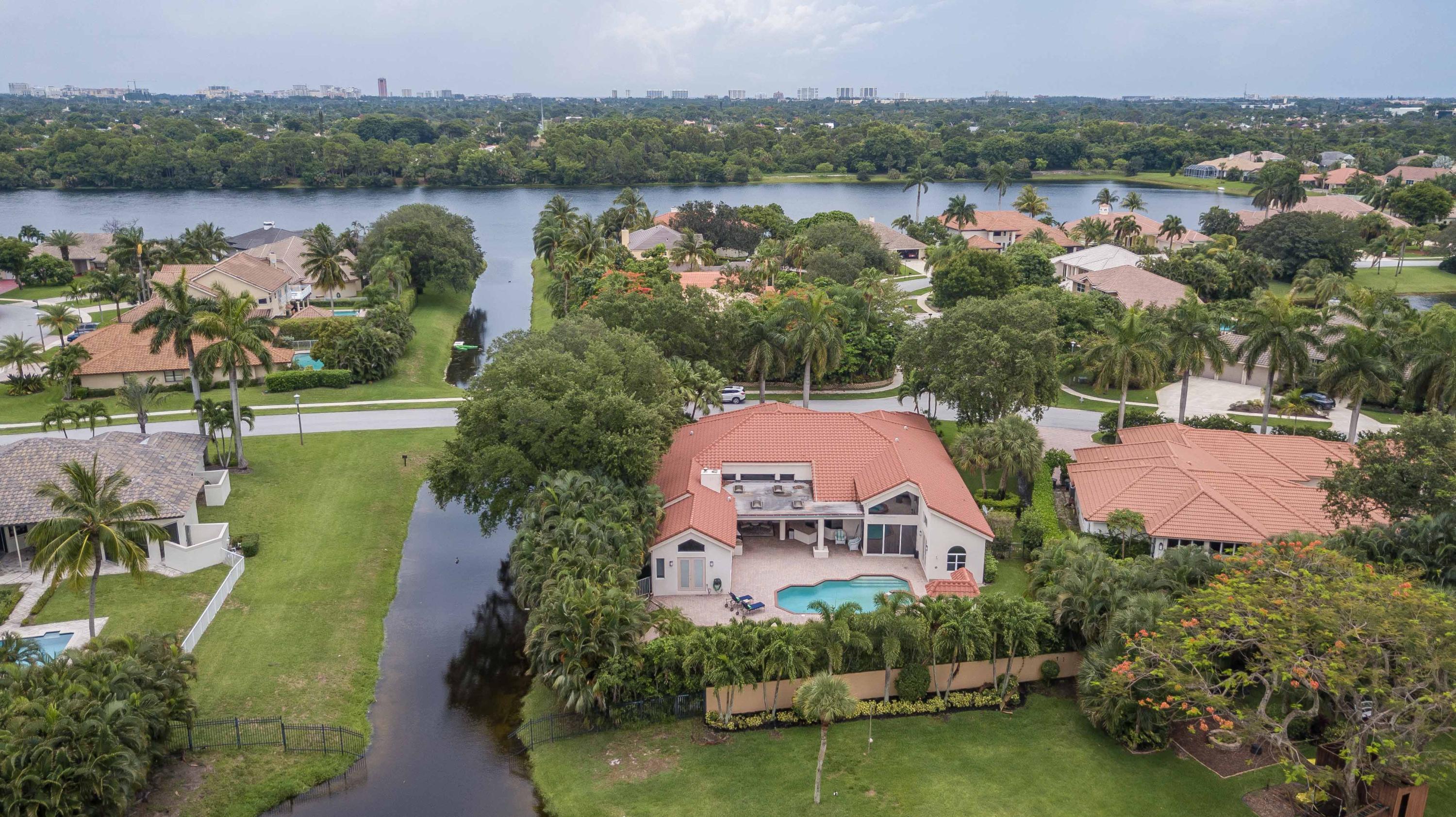 1605 Southwest 20th Avenue Boca Raton, FL 33486 - Photo 60 of 70 an aerial view of lake residential house with outdoor space and swimming pool