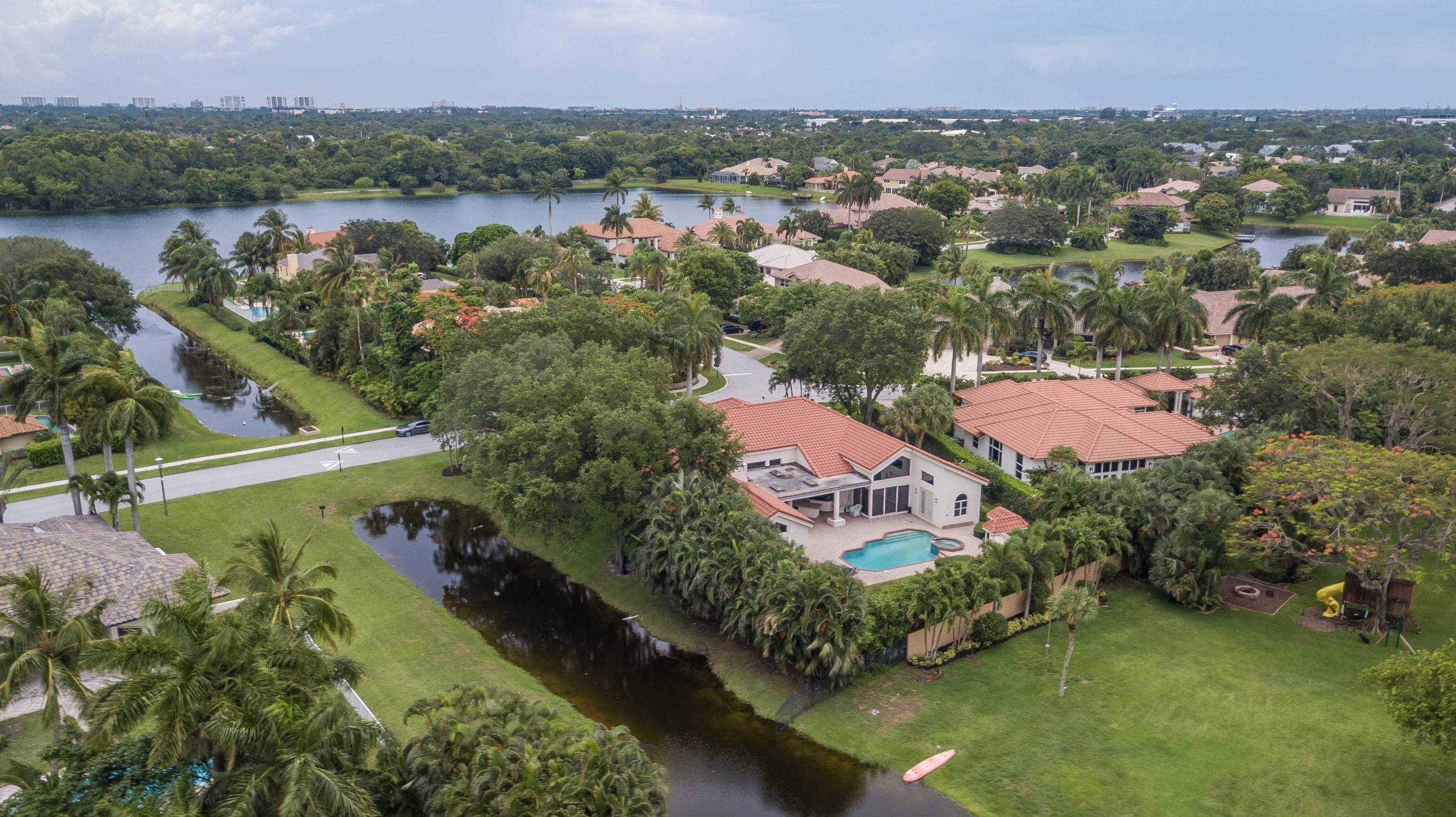 1605 Southwest 20th Avenue Boca Raton, FL 33486 - Photo 61 of 70 a view of lake and houses with outdoor space