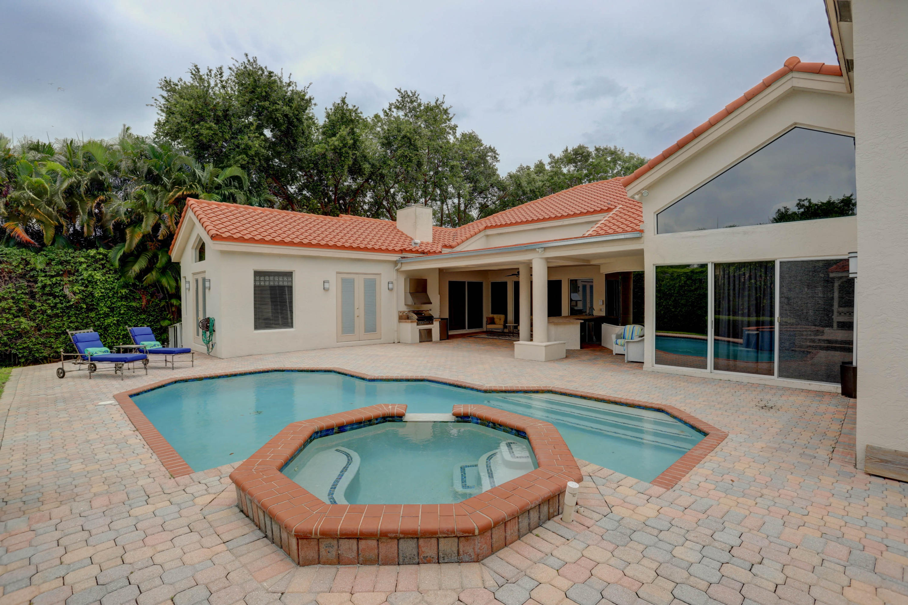 1605 Southwest 20th Avenue Boca Raton, FL 33486 - Photo 68 of 70 a view of a house with swimming pool and sitting area