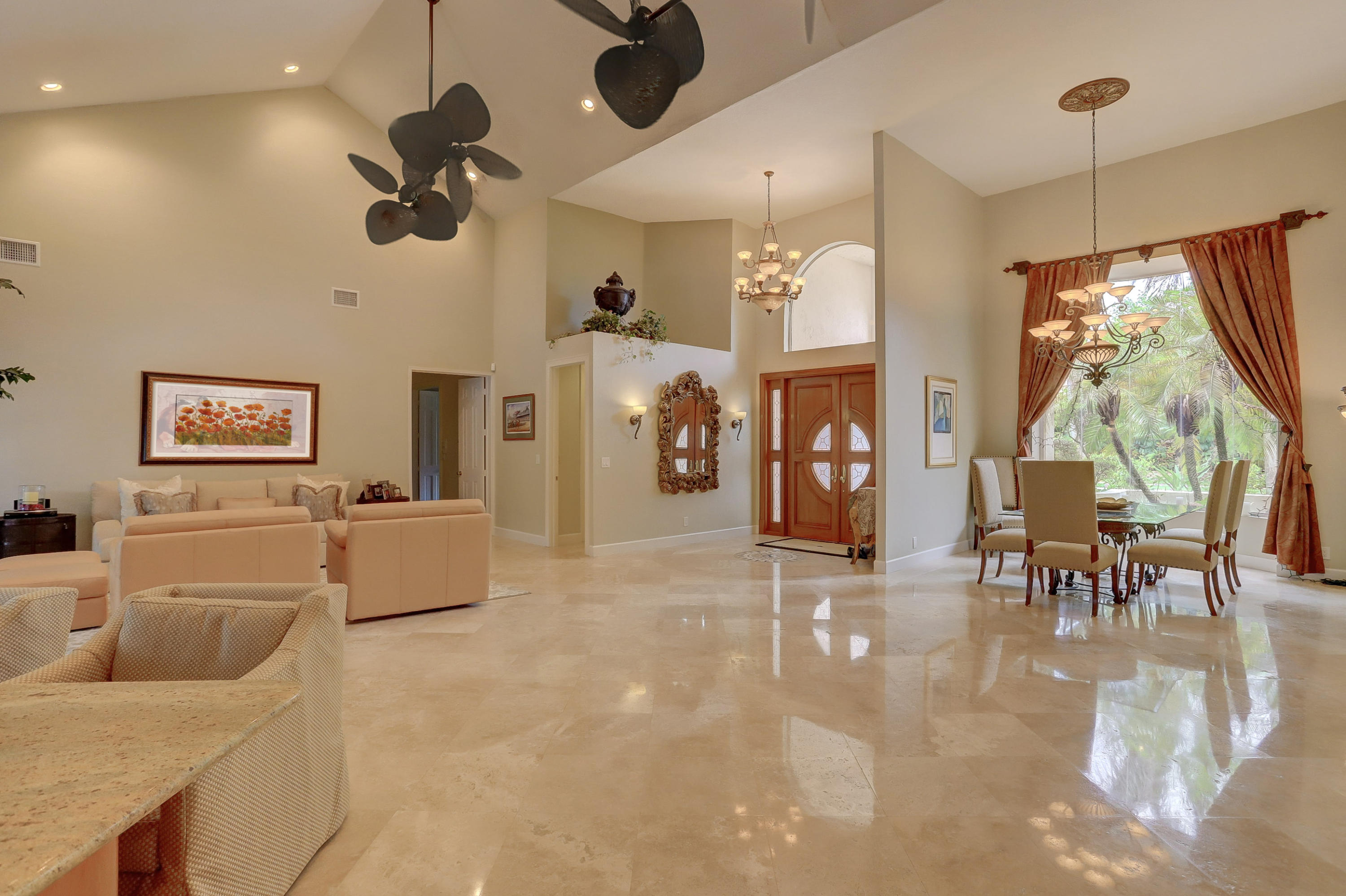1605 Southwest 20th Avenue Boca Raton, FL 33486 - Photo 10 of 70 a living room with furniture and a large window