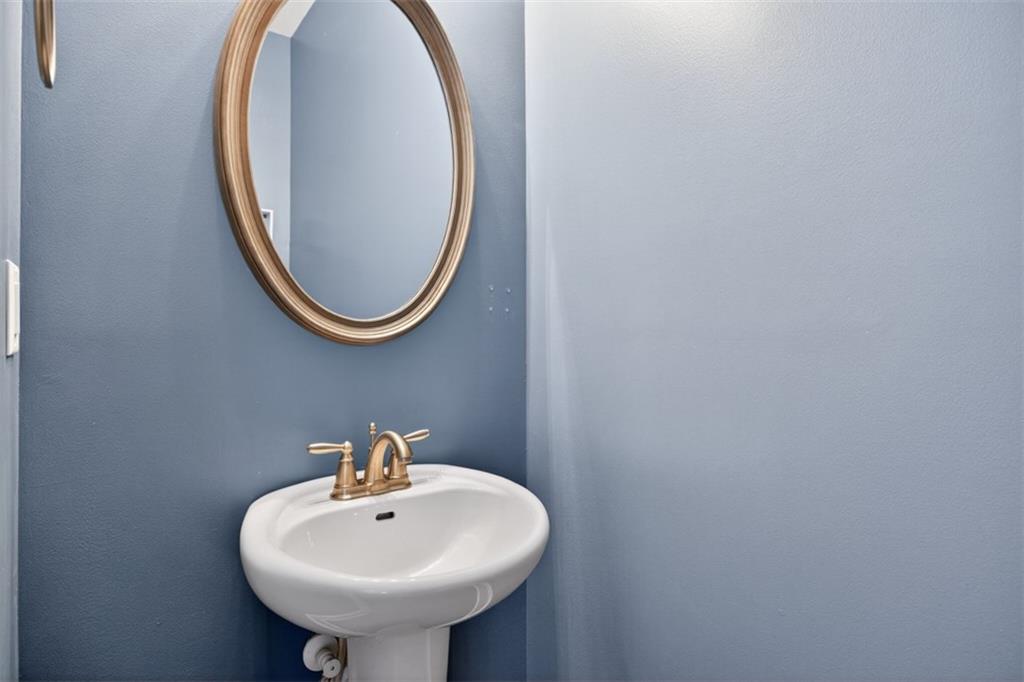 2854 Jordan Oaks Lane, Unit 8 Decatur, GA 30033 - Photo 15 of 41 a bathroom with a sink and a mirror
