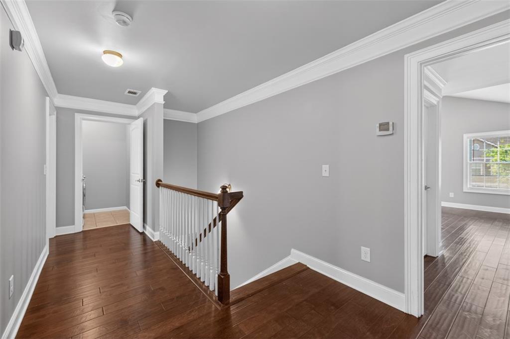 2854 Jordan Oaks Lane, Unit 8 Decatur, GA 30033 - Photo 16 of 41 a view of an empty room with wooden floor