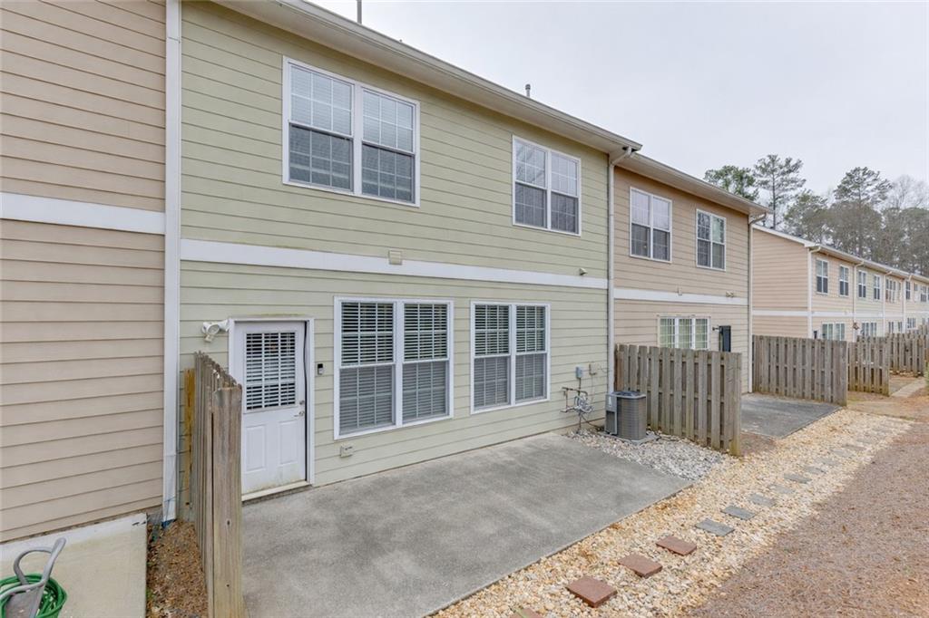 2854 Jordan Oaks Lane, Unit 8 Decatur, GA 30033 - Photo 36 of 41 a view of a house with wooden fence