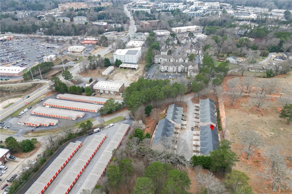 2854 Jordan Oaks Lane, Unit 8 Decatur, GA 30033 - Photo 40 of 41 an aerial view of residential houses with outdoor space