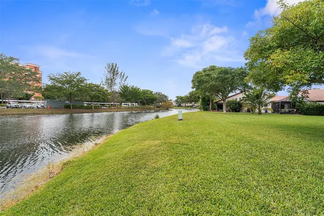 $444,900 | 3056 Deer Creek Lake Shore Drive, Unit 3056, Deerfield Beach, FL 33442