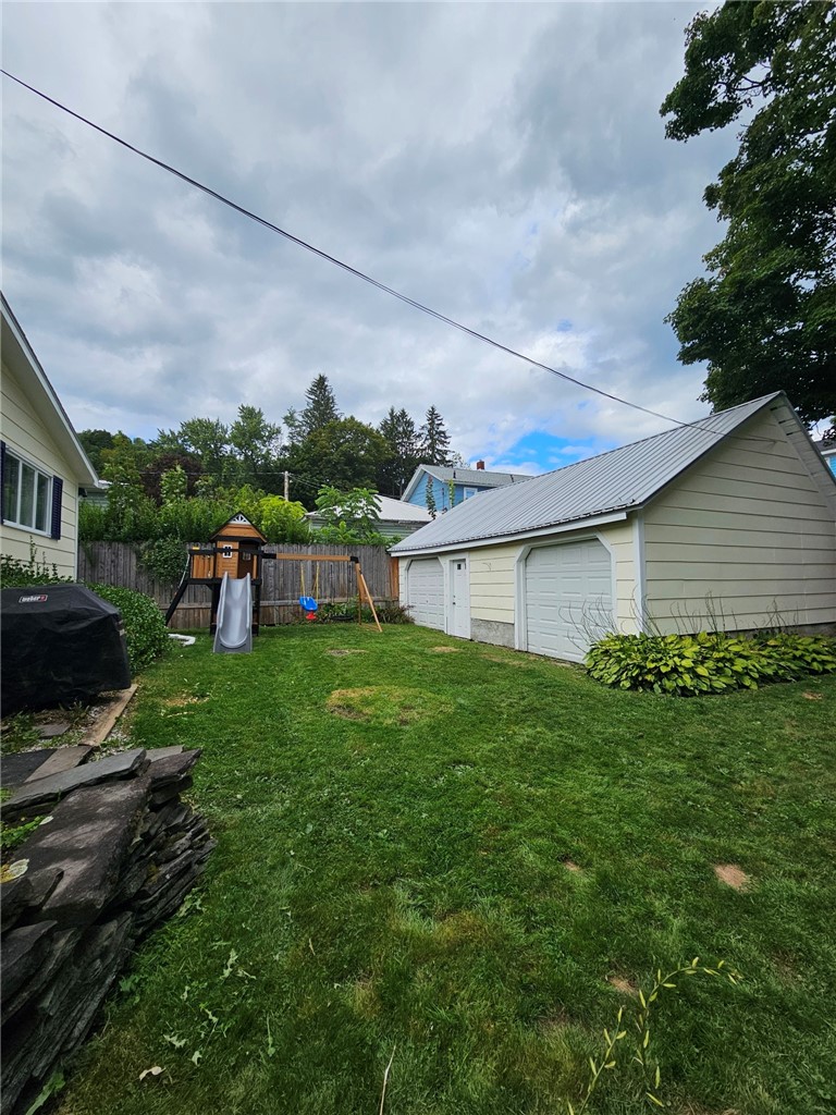 76 Ford Avenue Oneonta, NY 13820 - Photo 3 of 33 Garage and yard