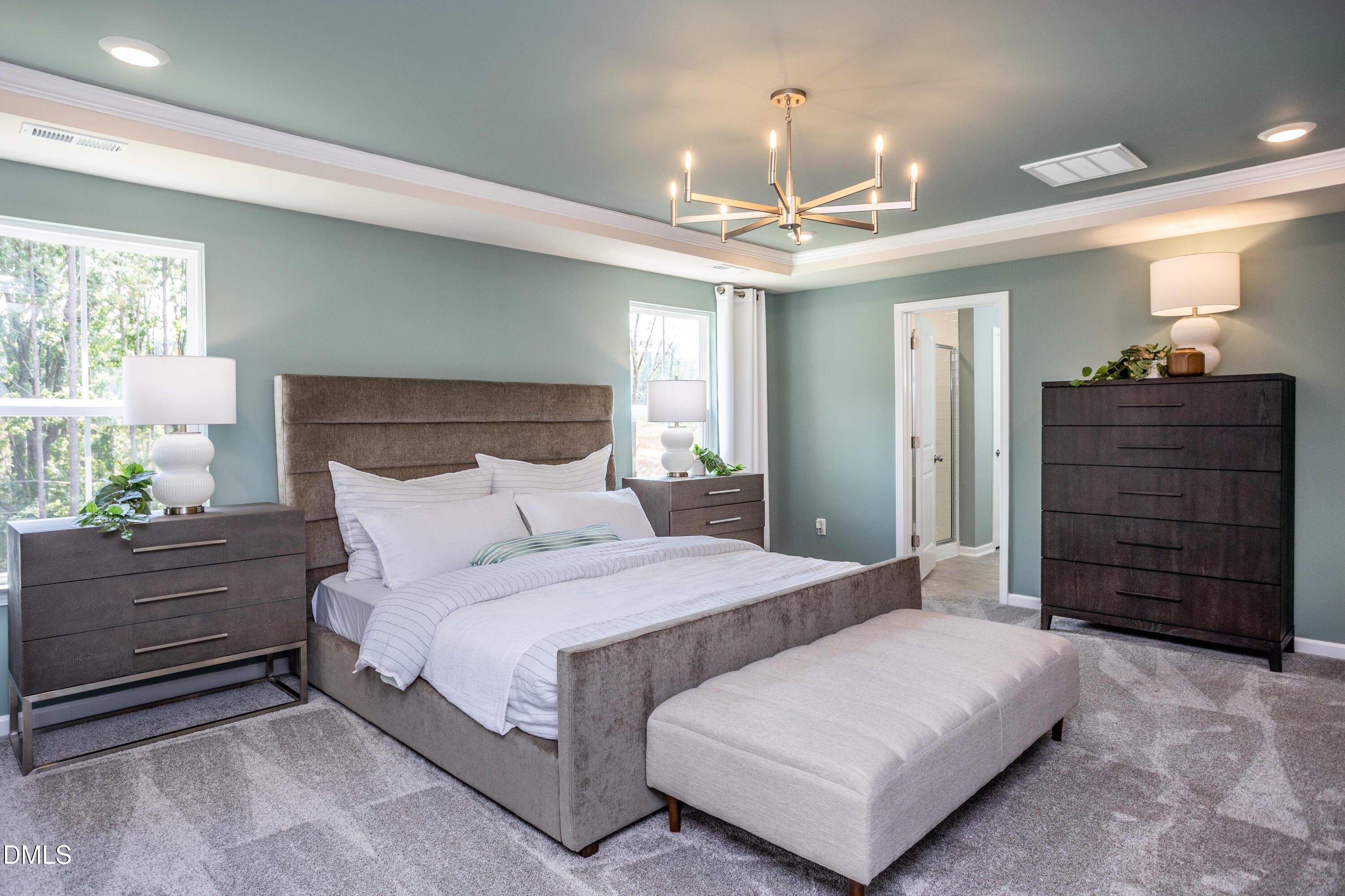 636 Fosterton Cottage Way Raleigh, NC 27603 - Photo 11 of 29 a bedroom with a bed and a dresser