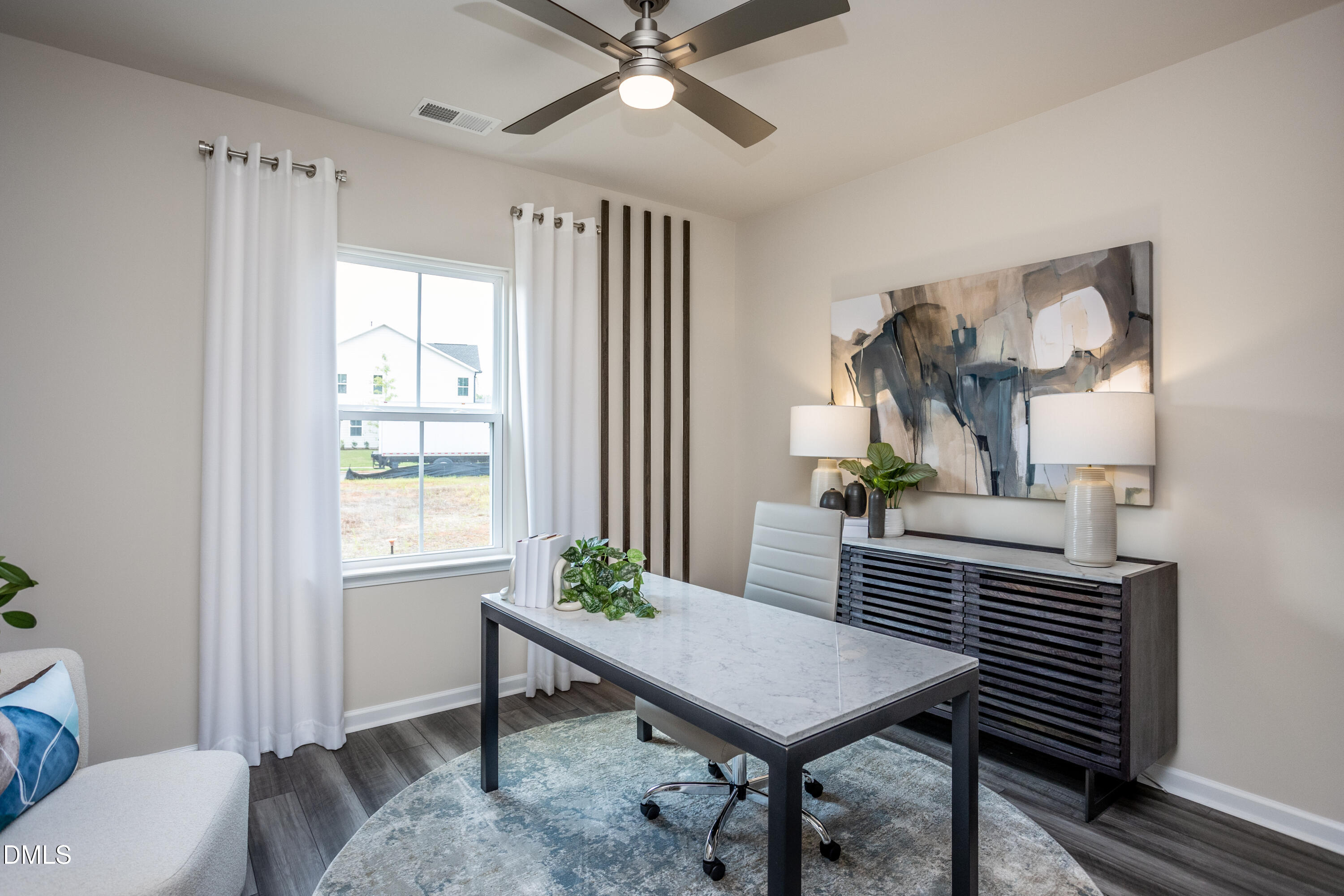 636 Fosterton Cottage Way Raleigh, NC 27603 - Photo 19 of 29 a view of a livingroom with furniture and window