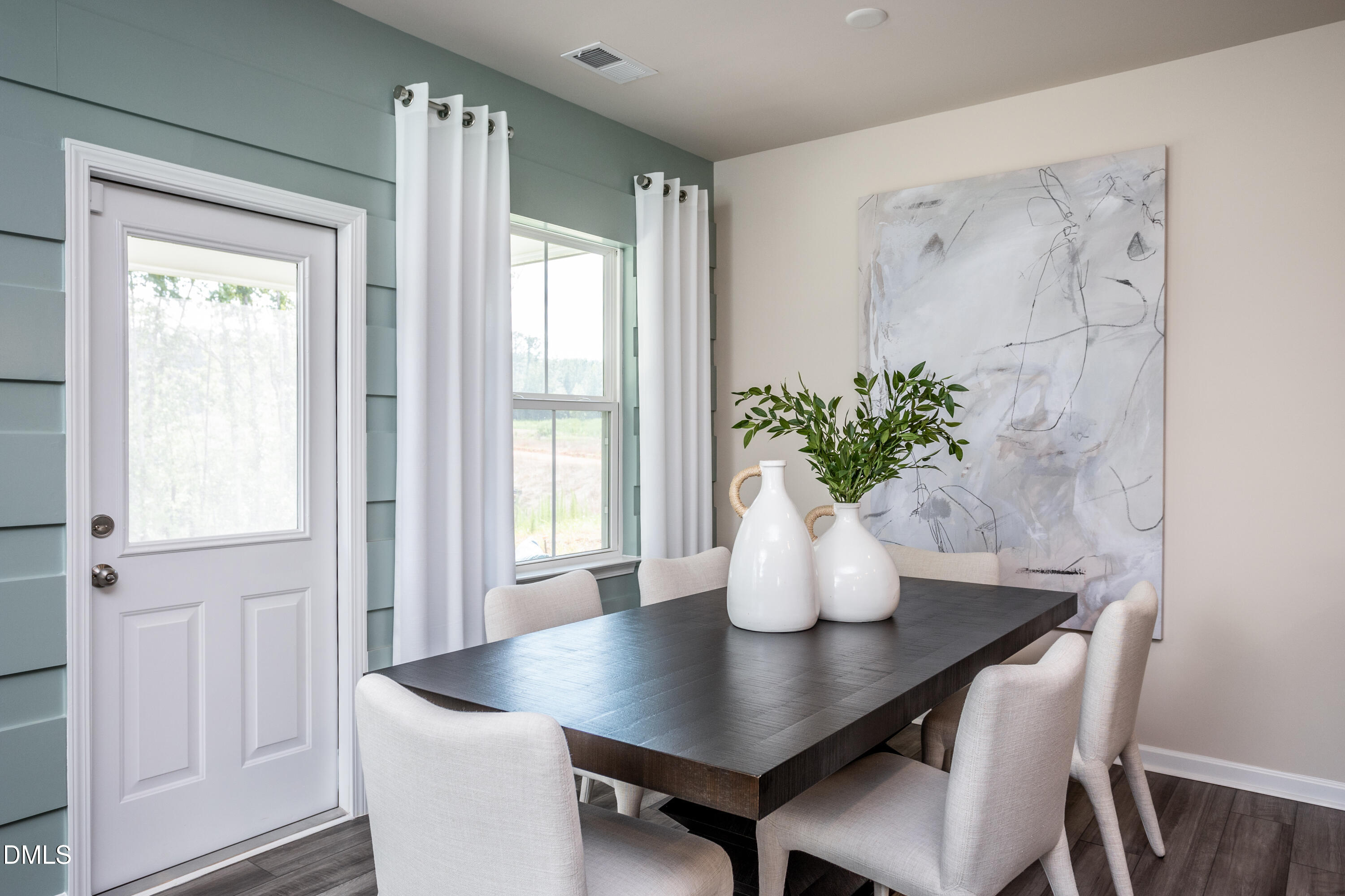 636 Fosterton Cottage Way Raleigh, NC 27603 - Photo 20 of 29 a dining room with furniture and wooden floor