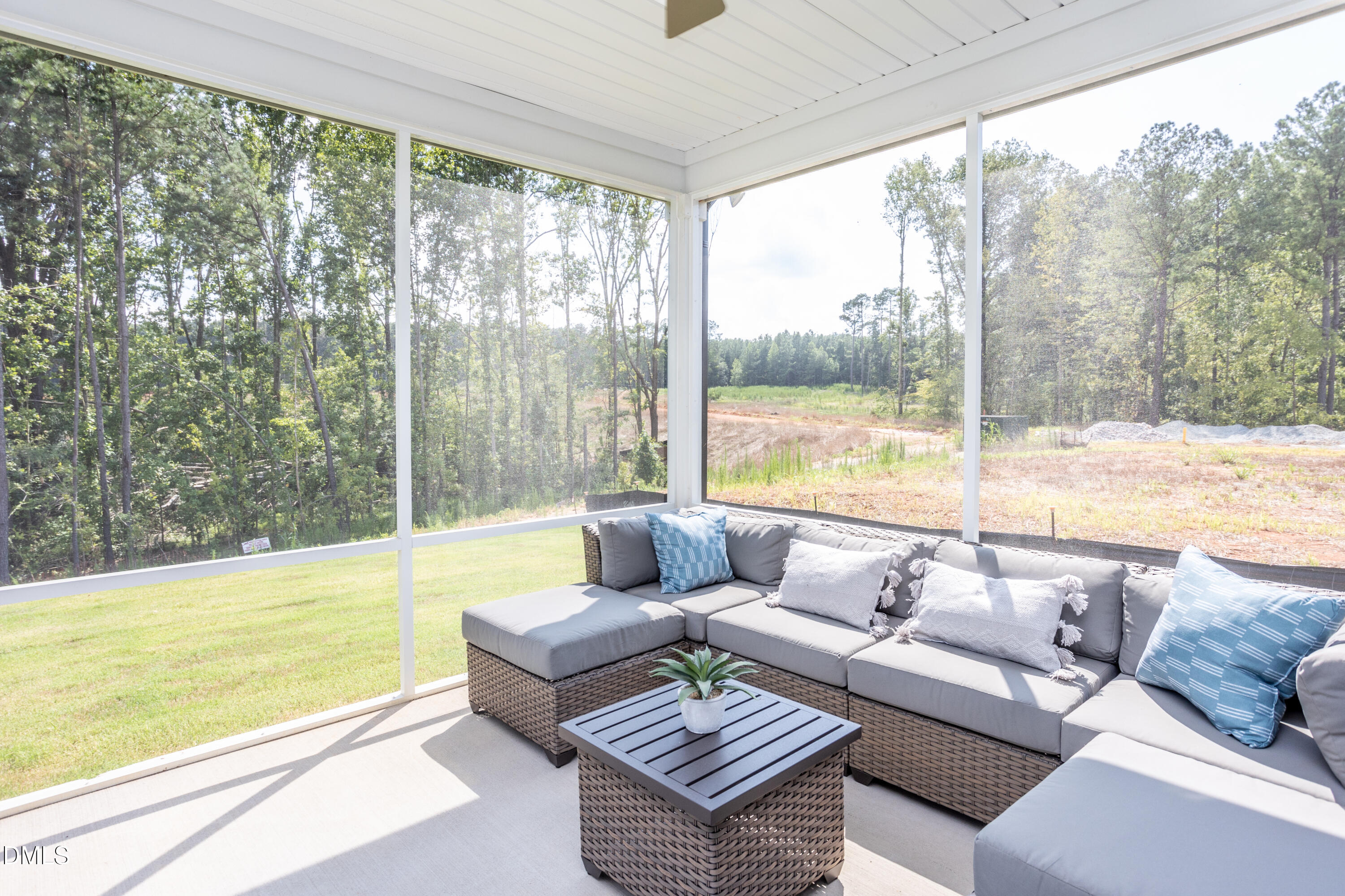 636 Fosterton Cottage Way Raleigh, NC 27603 - Photo 21 of 29 a living room with furniture and a large window