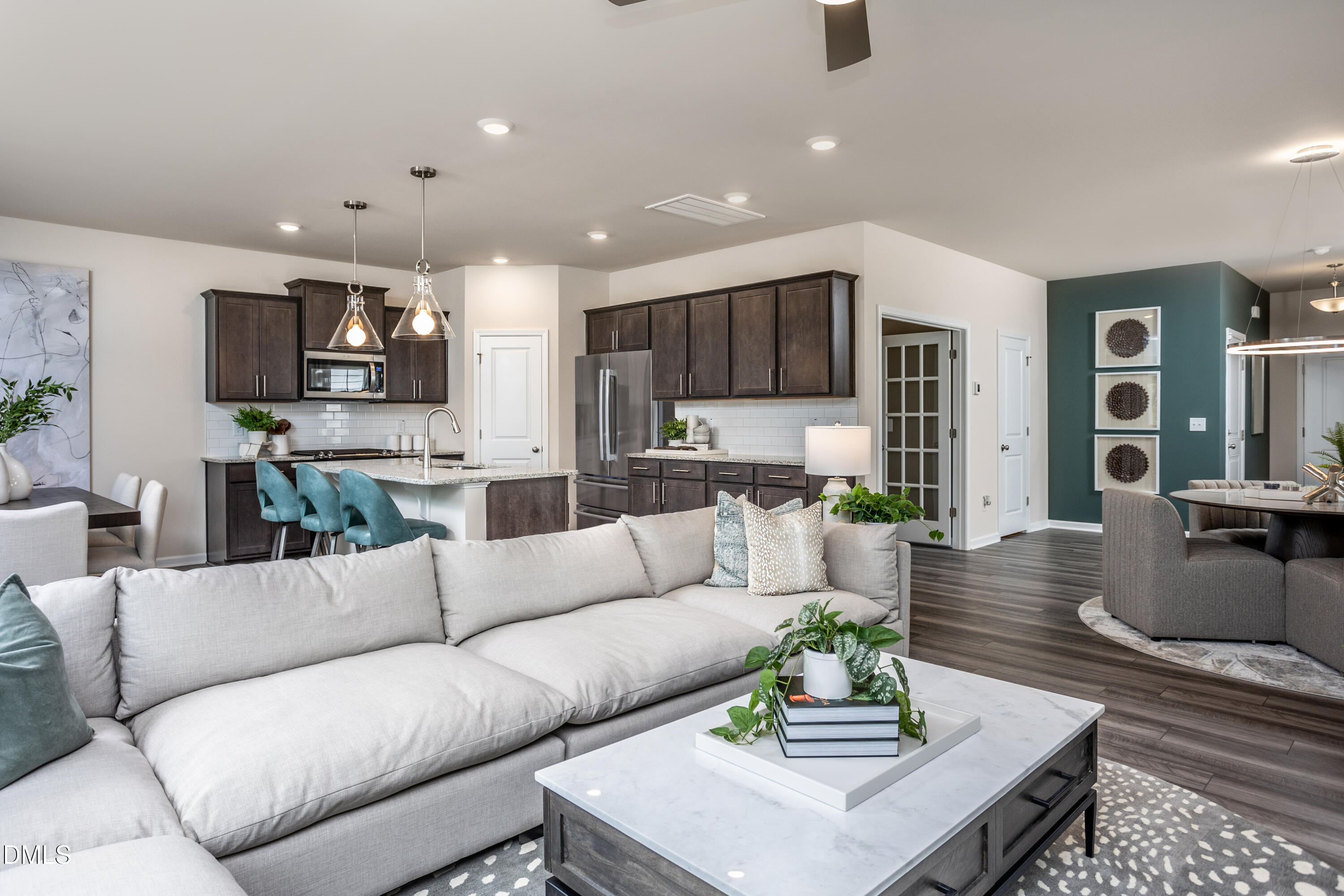 636 Fosterton Cottage Way Raleigh, NC 27603 - Photo 10 of 29 a living room with furniture and a wooden floor