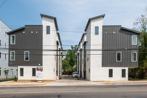 a view of a house with a street