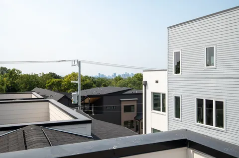 a view of balcony with two chairs