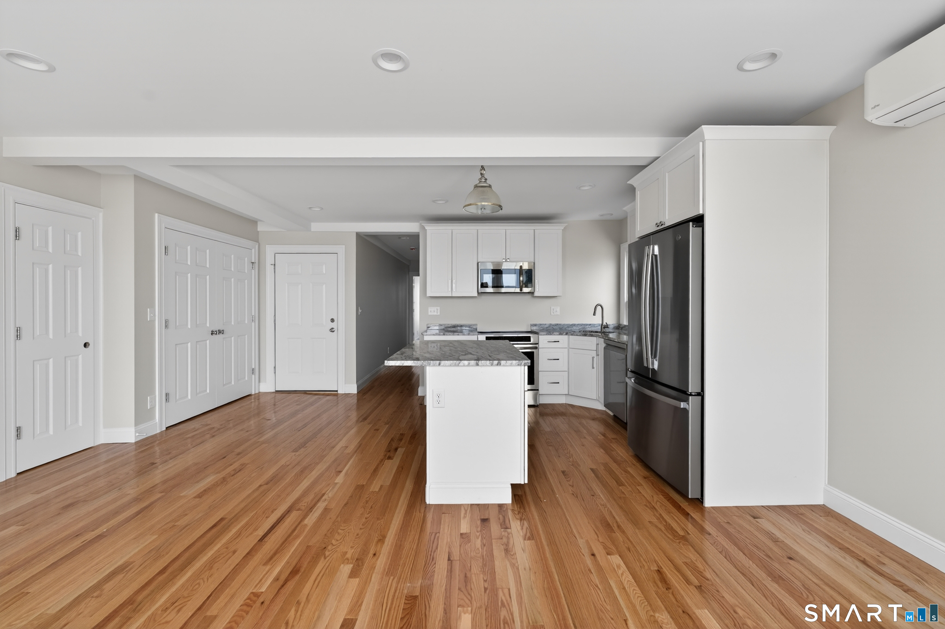 138 Bank Street, Unit 2A New London, CT 06320 - Photo 10 of 22 a kitchen with a refrigerator a sink and dishwasher