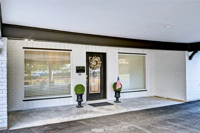 a view of entrance door of house