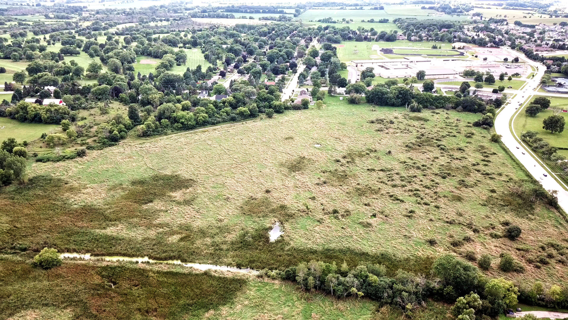 325 Sunset Drive, Unit 330 Hartford, WI 53027 - Photo 8 of 52 Aerial View from South