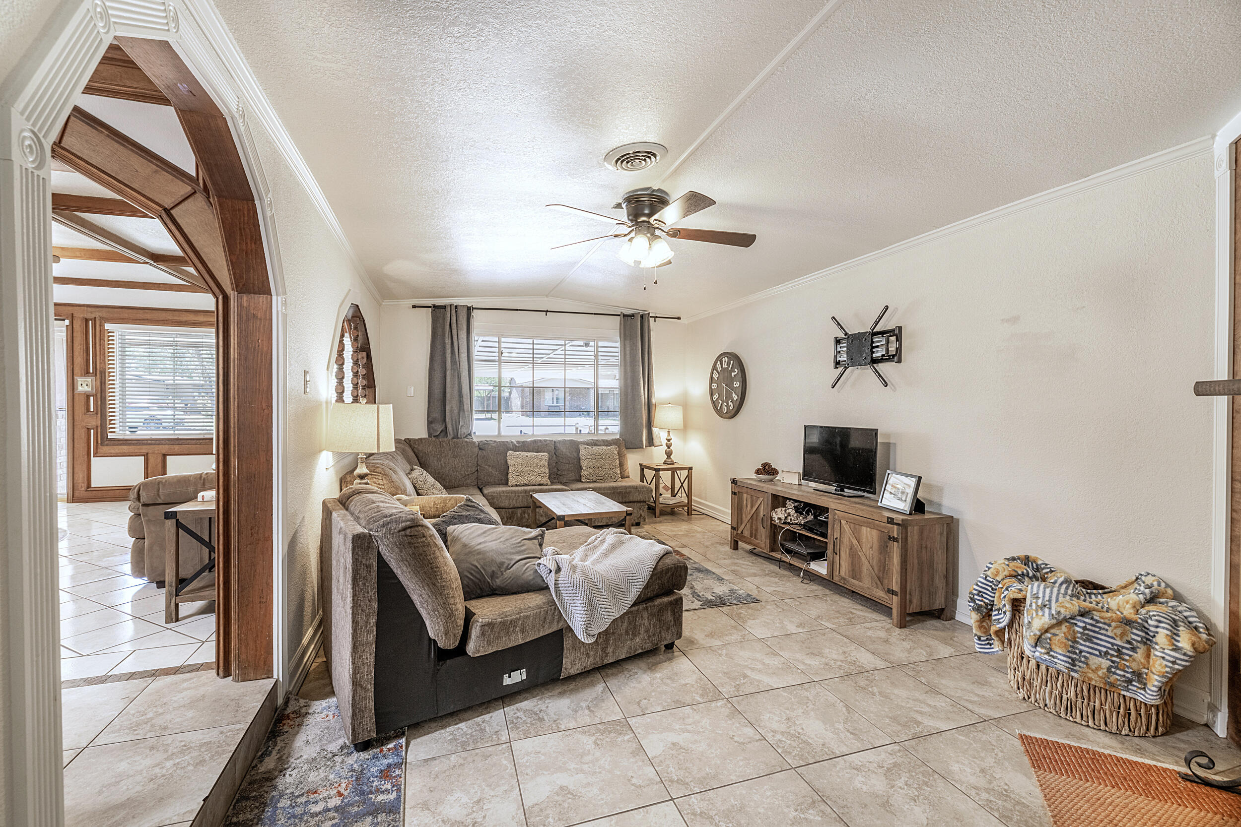 4210 44th Street Lubbock, TX 79413 - Photo 12 of 28 a living room with furniture and a window