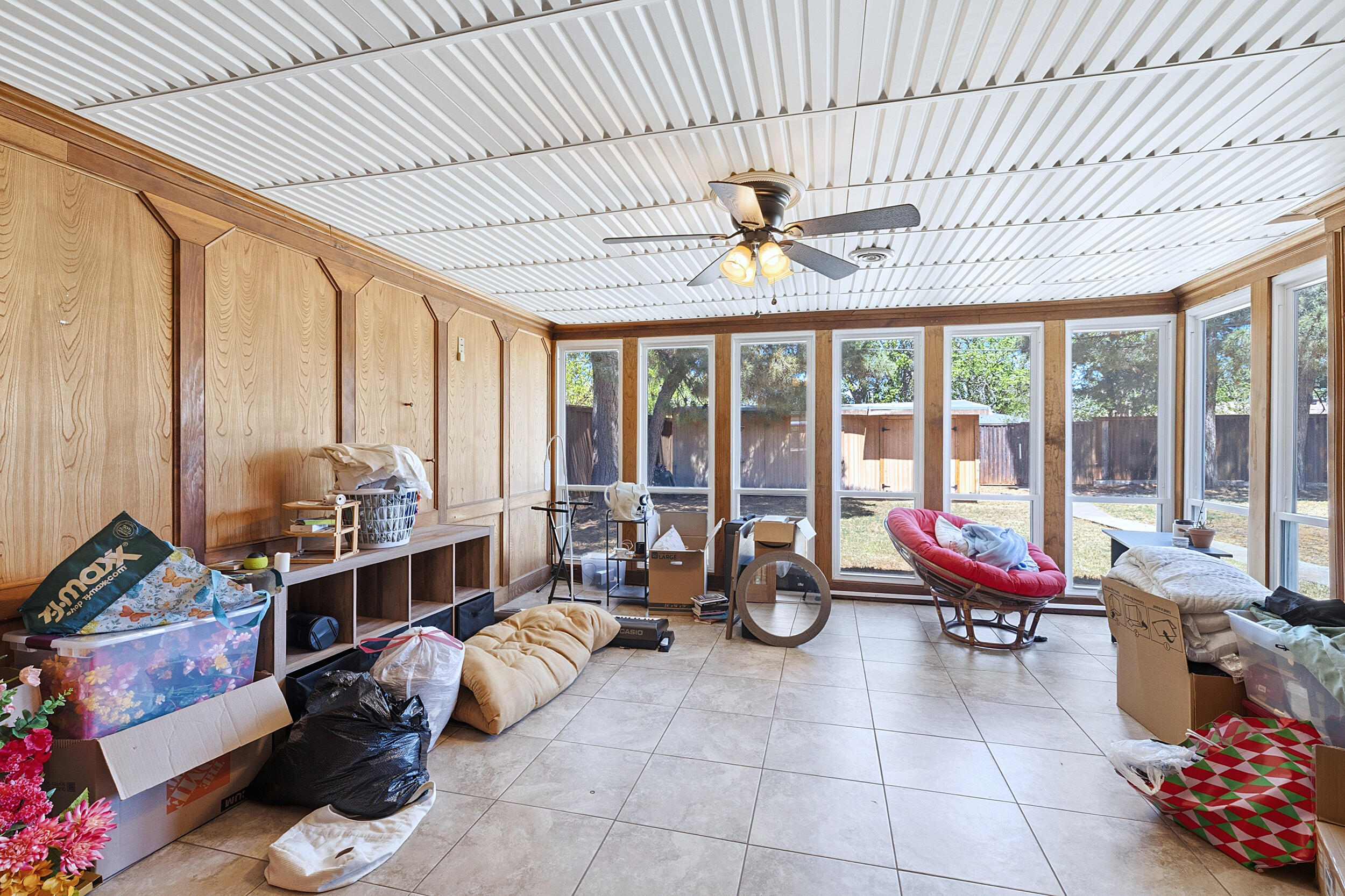 4210 44th Street Lubbock, TX 79413 - Photo 13 of 28 a room with furniture and large windows