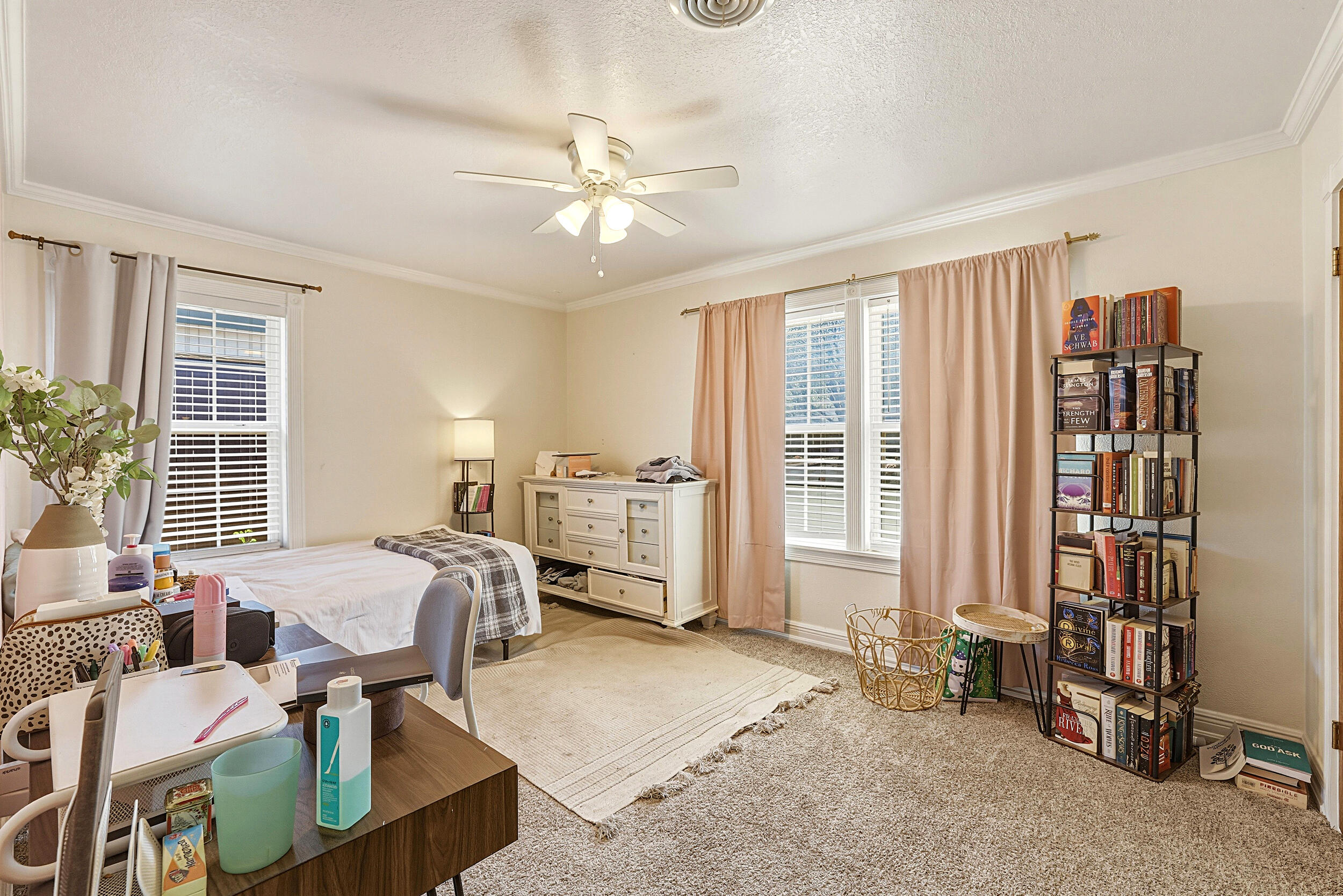 4210 44th Street Lubbock, TX 79413 - Photo 18 of 28 a view of a livingroom with furniture and a window