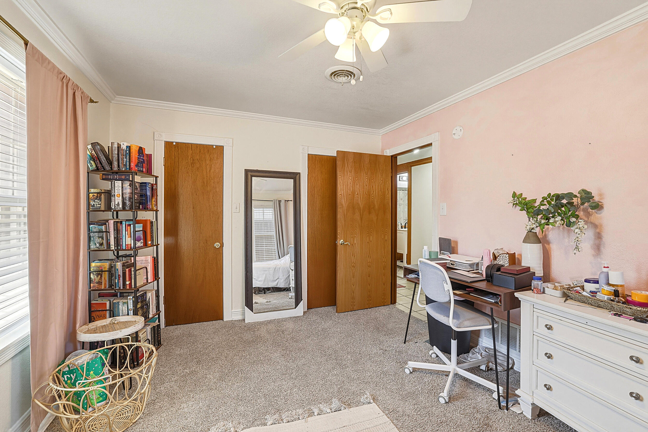 4210 44th Street Lubbock, TX 79413 - Photo 19 of 28 a view of a livingroom with furniture and a window