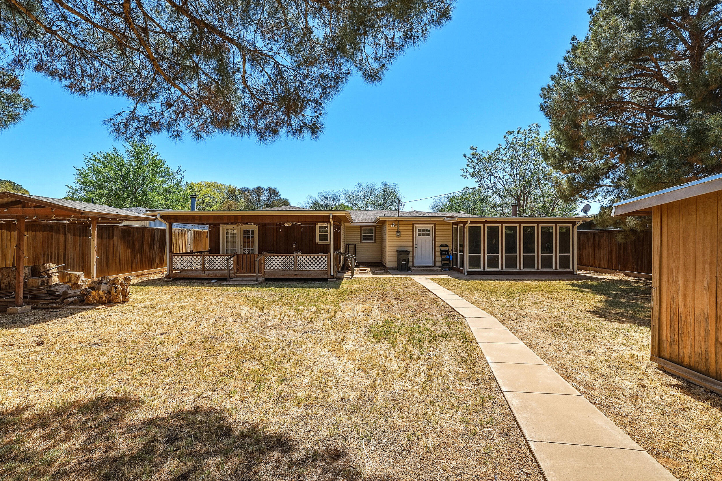 4210 44th Street Lubbock, TX 79413 - Photo 25 of 28 a view of a house with a patio