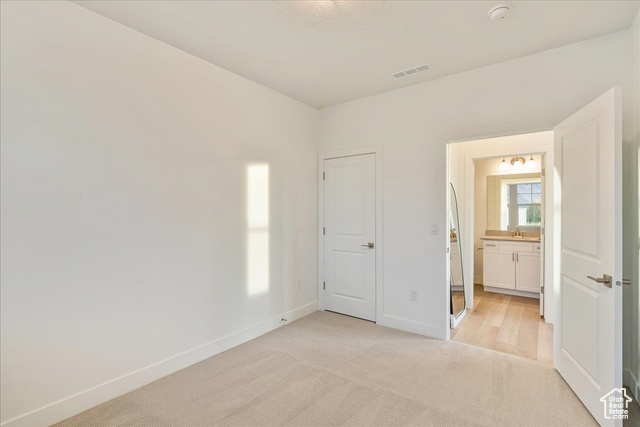 2033 Fortune Lane, Unit 462 Mapleton, UT 84664 - Photo 22 of 27 secondary bedroom or office in front of the home with full bathroom adjacent