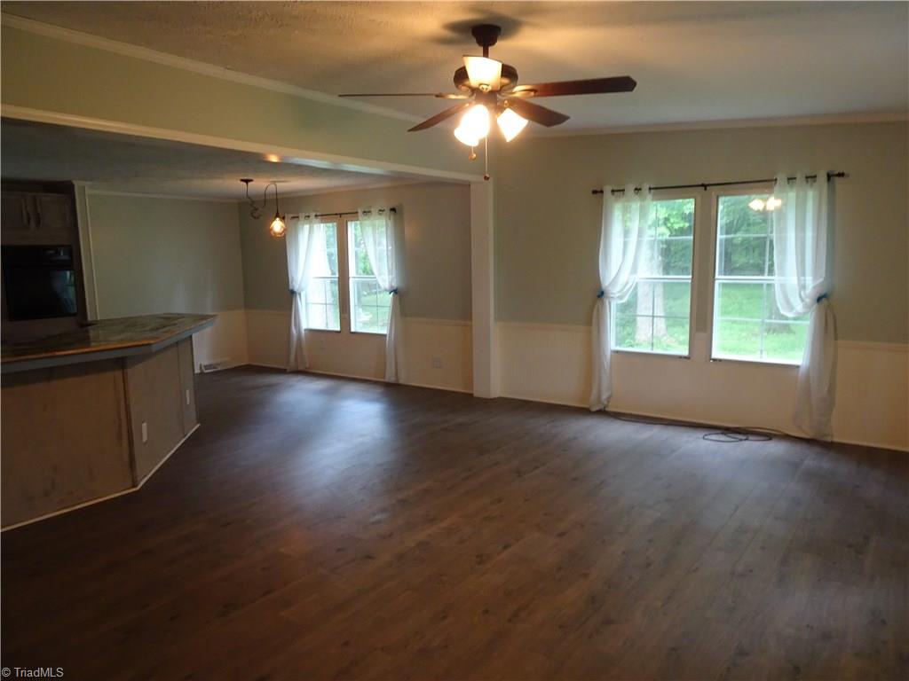 159 Nicholson Road Winston-Salem, NC 27107 - Photo 22 of 28 Great room, kitchen, dining area at yellow house