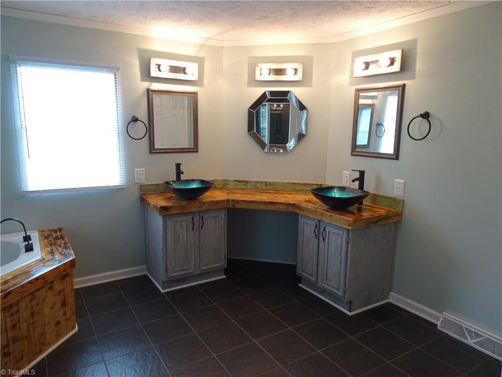 159 Nicholson Road Winston-Salem, NC 27107 - Photo 24 of 28 updated master bath, tub, shower & tile flooring