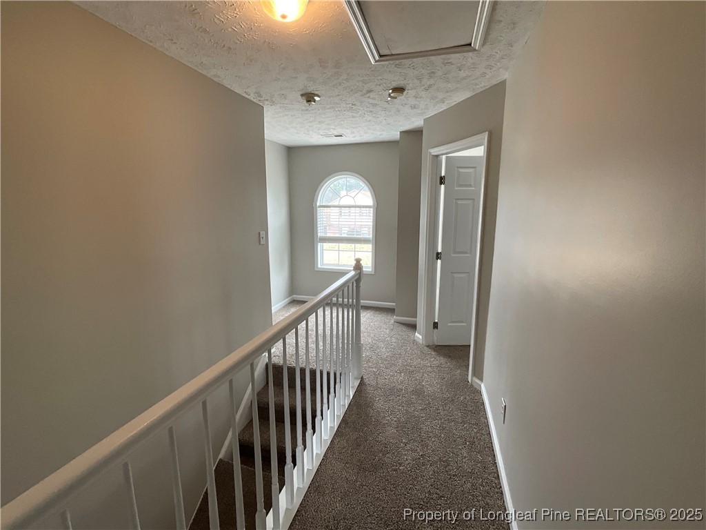 209 Pecan Trace Road Raeford, NC 28376 - Photo 12 of 24 a view of a hallway view with staircase