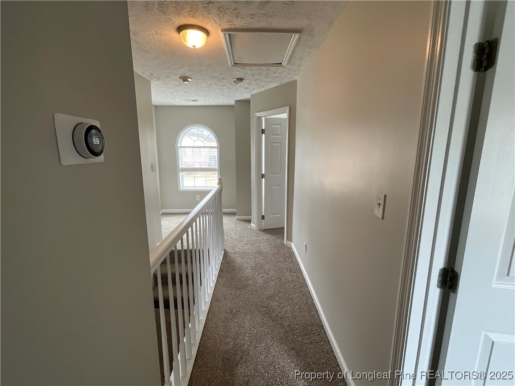 209 Pecan Trace Road Raeford, NC 28376 - Photo 13 of 24 a view of a hallway view with staircase