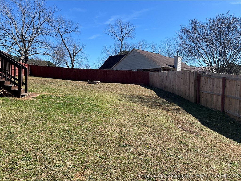 209 Pecan Trace Road Raeford, NC 28376 - Photo 22 of 24 a view of backyard of house
