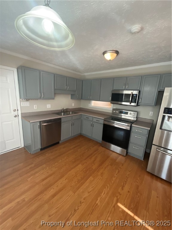 209 Pecan Trace Road Raeford, NC 28376 - Photo 5 of 24 a kitchen with stainless steel appliances granite countertop a sink and a stove