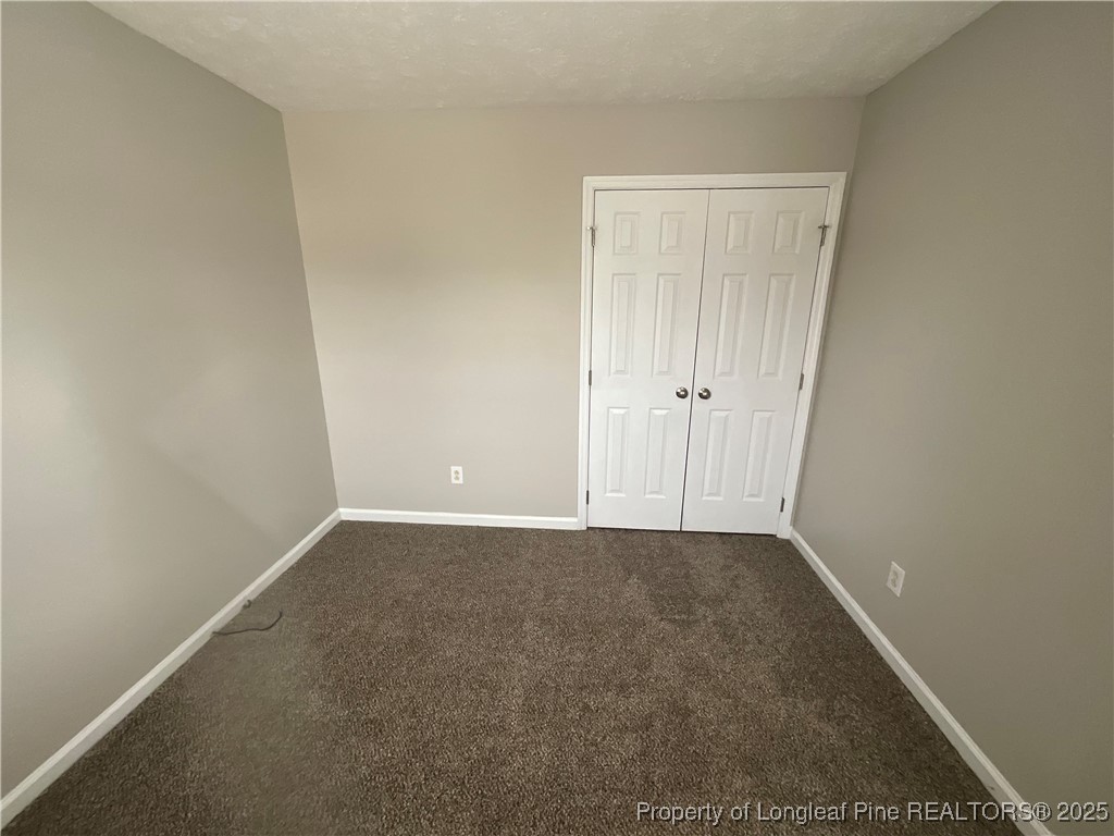 209 Pecan Trace Road Raeford, NC 28376 - Photo 9 of 24 a view of an empty room