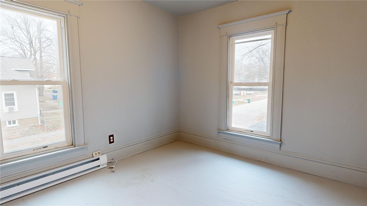 501 South Crea Street Decatur, IL 62522 - Photo 4 of 34 an empty room with windows