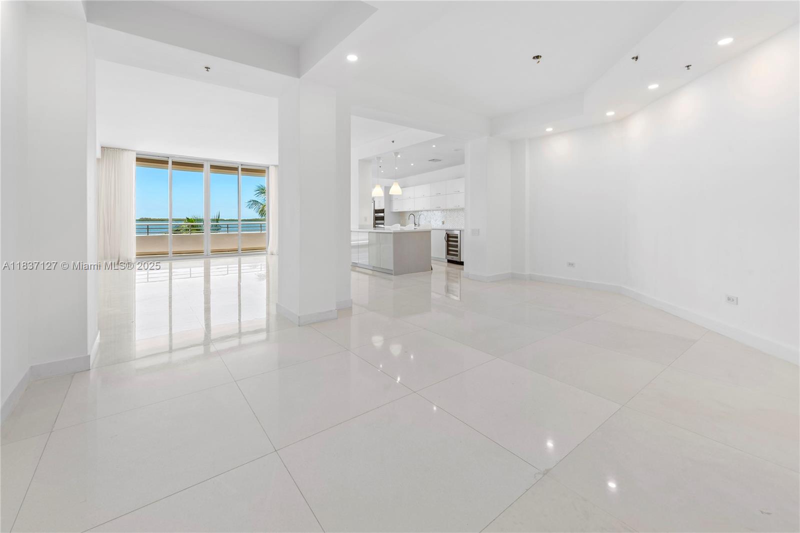 Brickell Miami, FL 33131 - Photo 3 of 65 a view of a kitchen with a refrigerator and a window