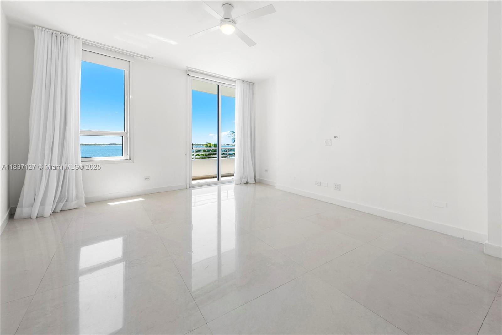 Brickell Miami, FL 33131 - Photo 36 of 65 an empty room with windows