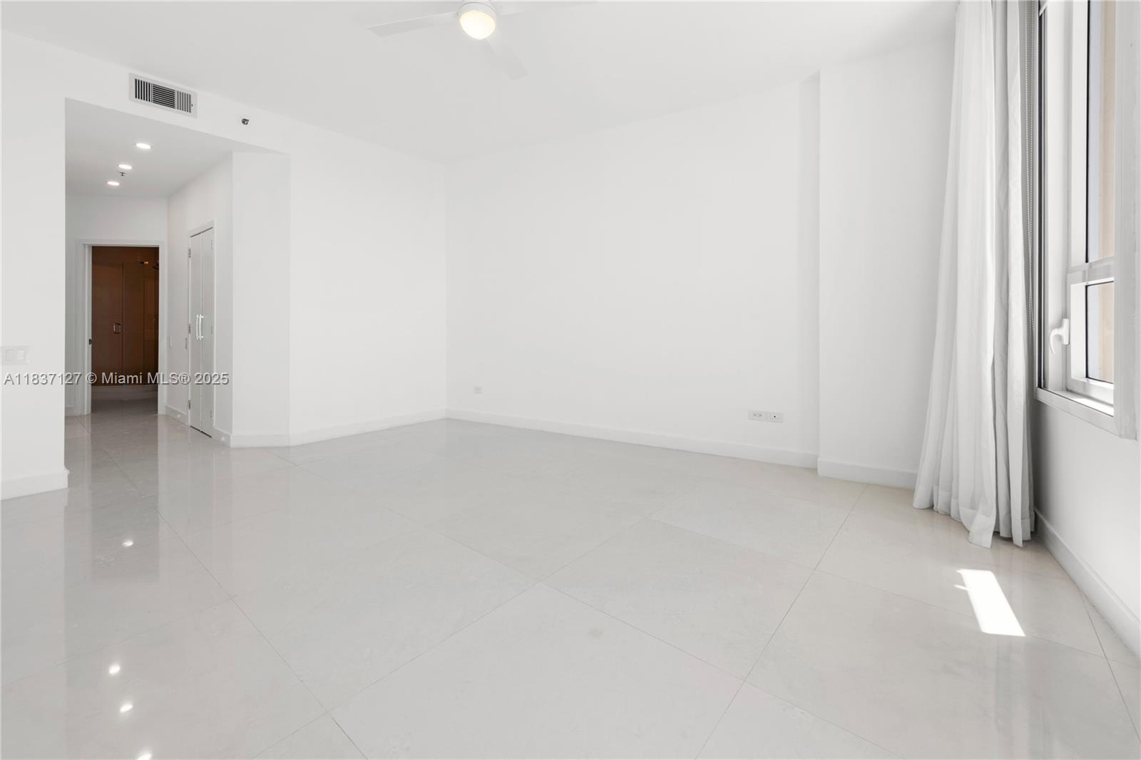 Brickell Miami, FL 33131 - Photo 37 of 65 an empty room with an entryway