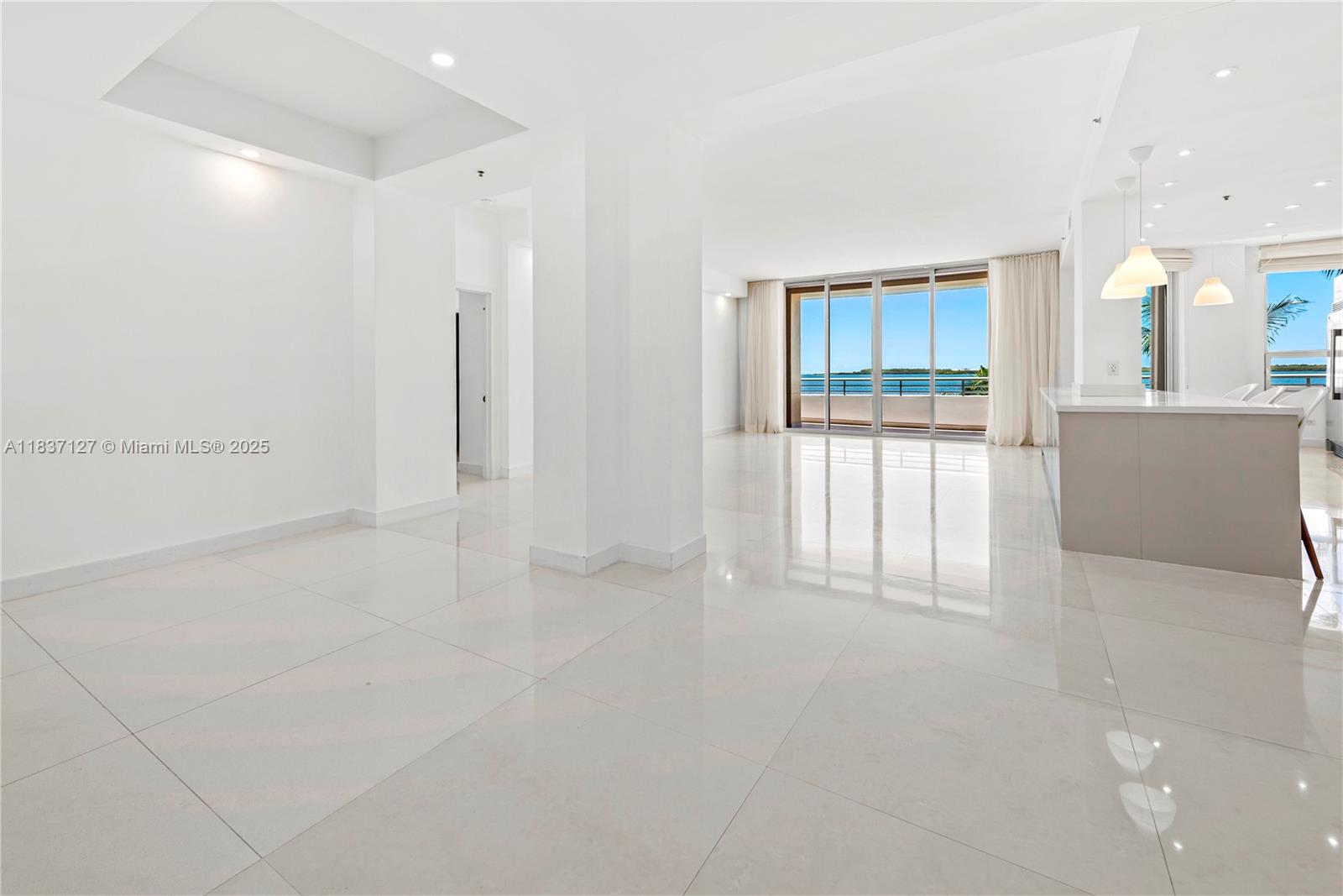 Brickell Miami, FL 33131 - Photo 6 of 65 a view of an empty room with a window