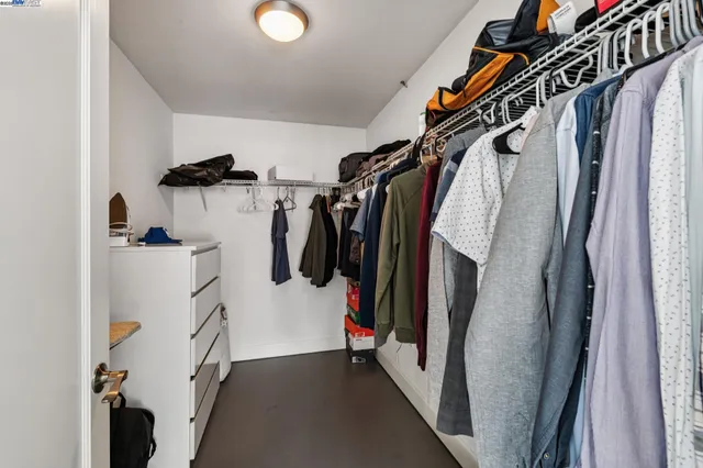 a view of a hallway with washer and dryer